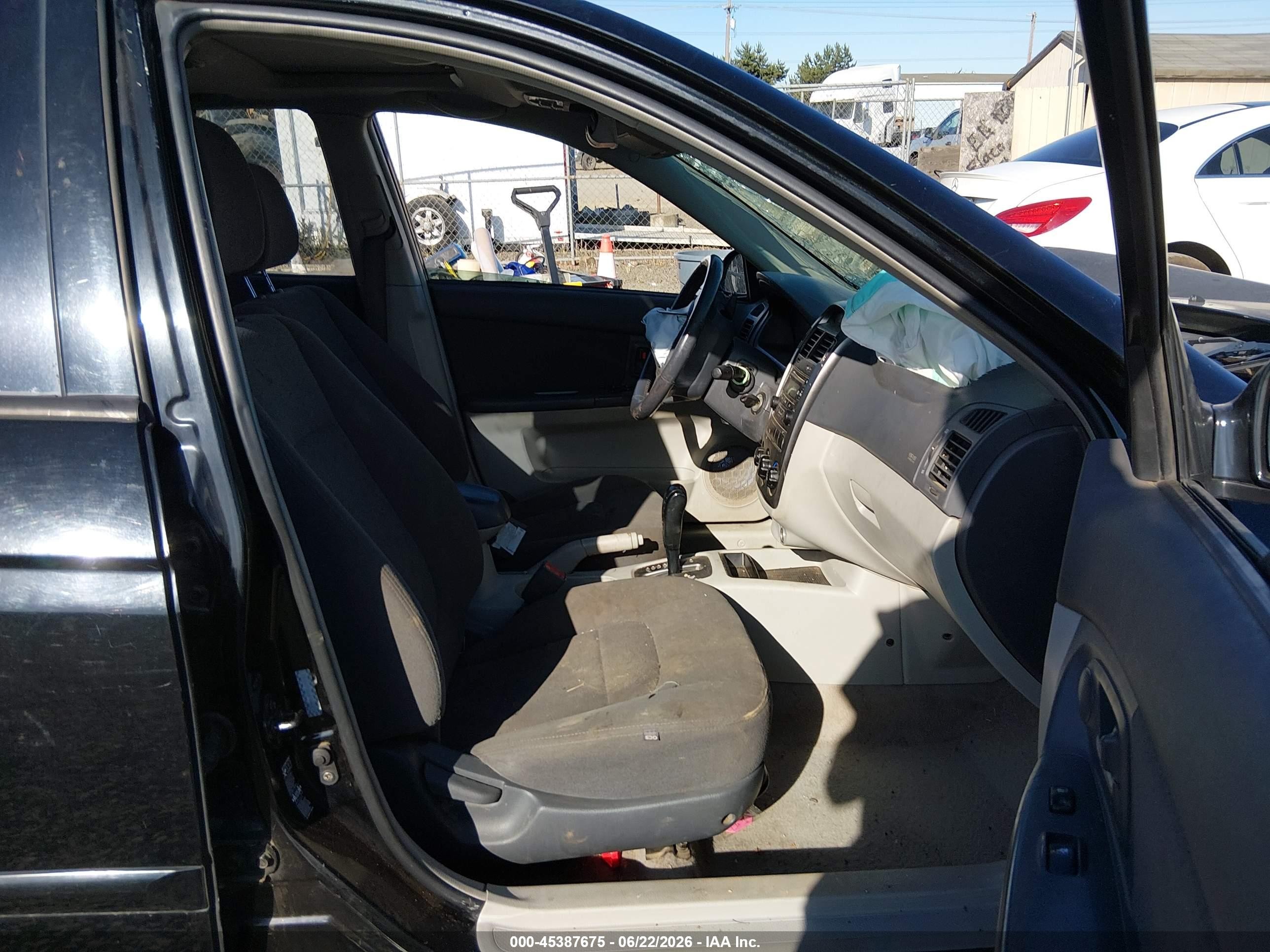 2005 Kia Spectra5   Black vin: KNAFE161355121369