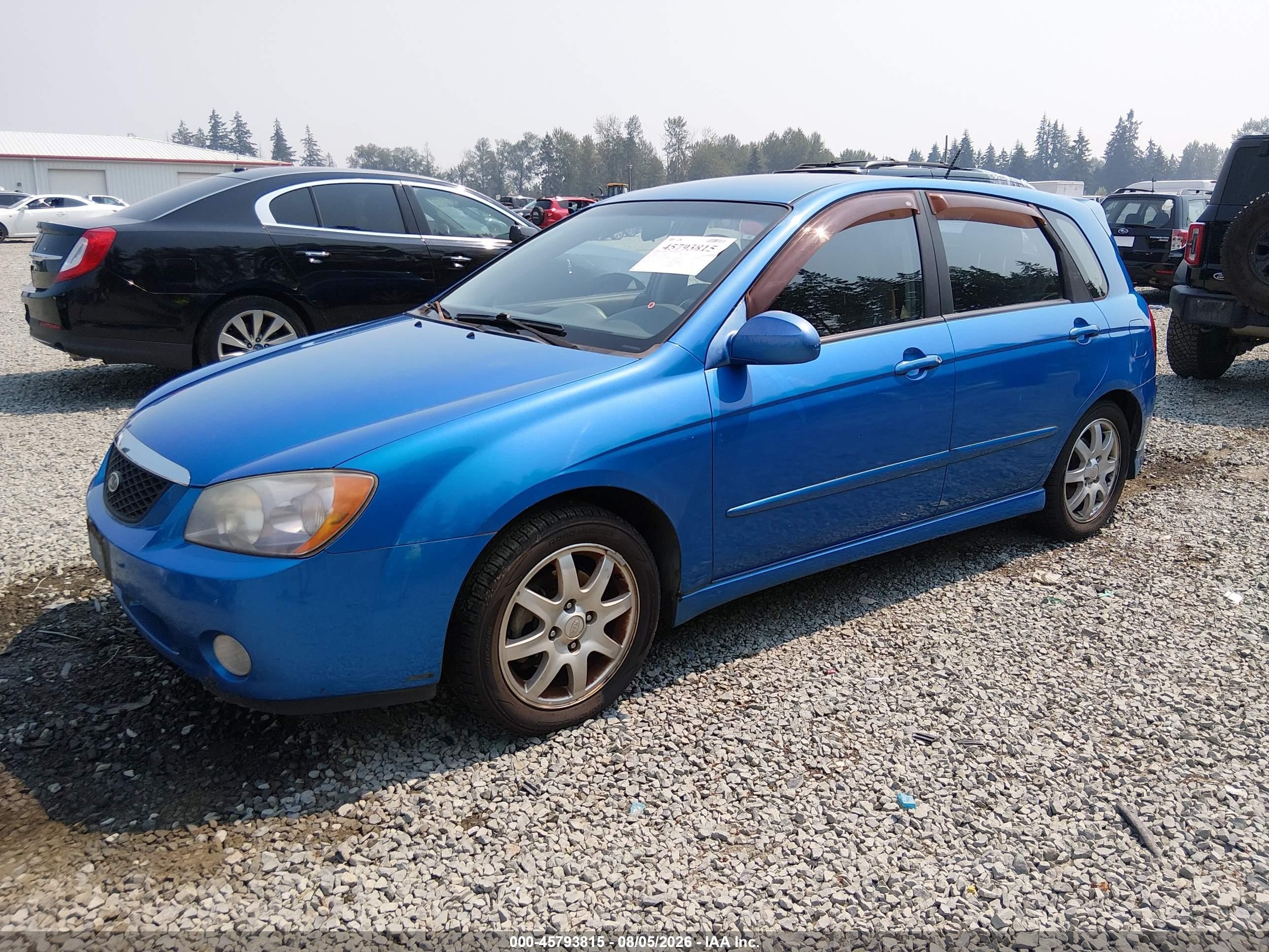 2006 Kia Spectra5   Blue vin: KNAFE161365362088