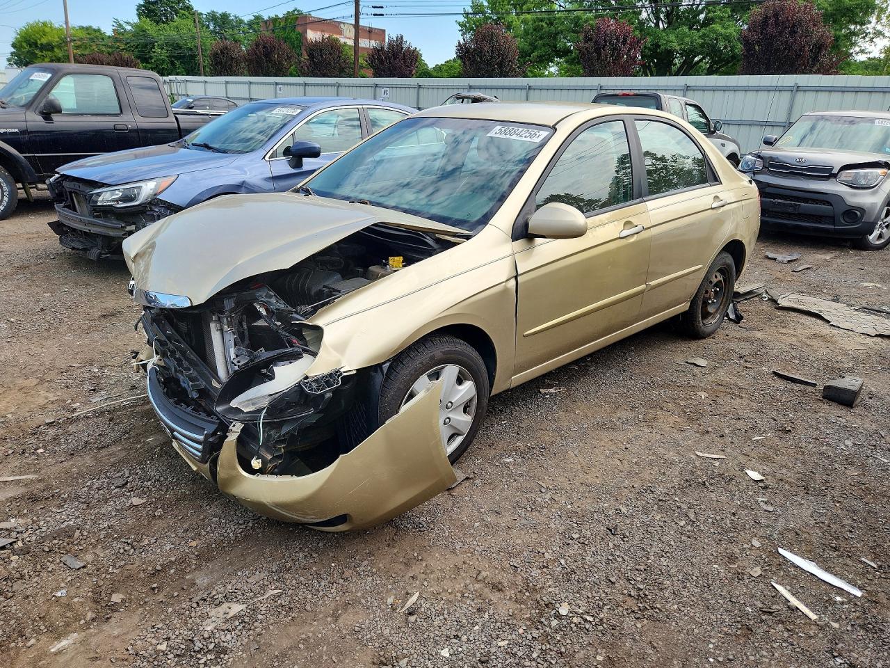 2009 Kia Spectra Ex Gold vin: KNAFE221095665832