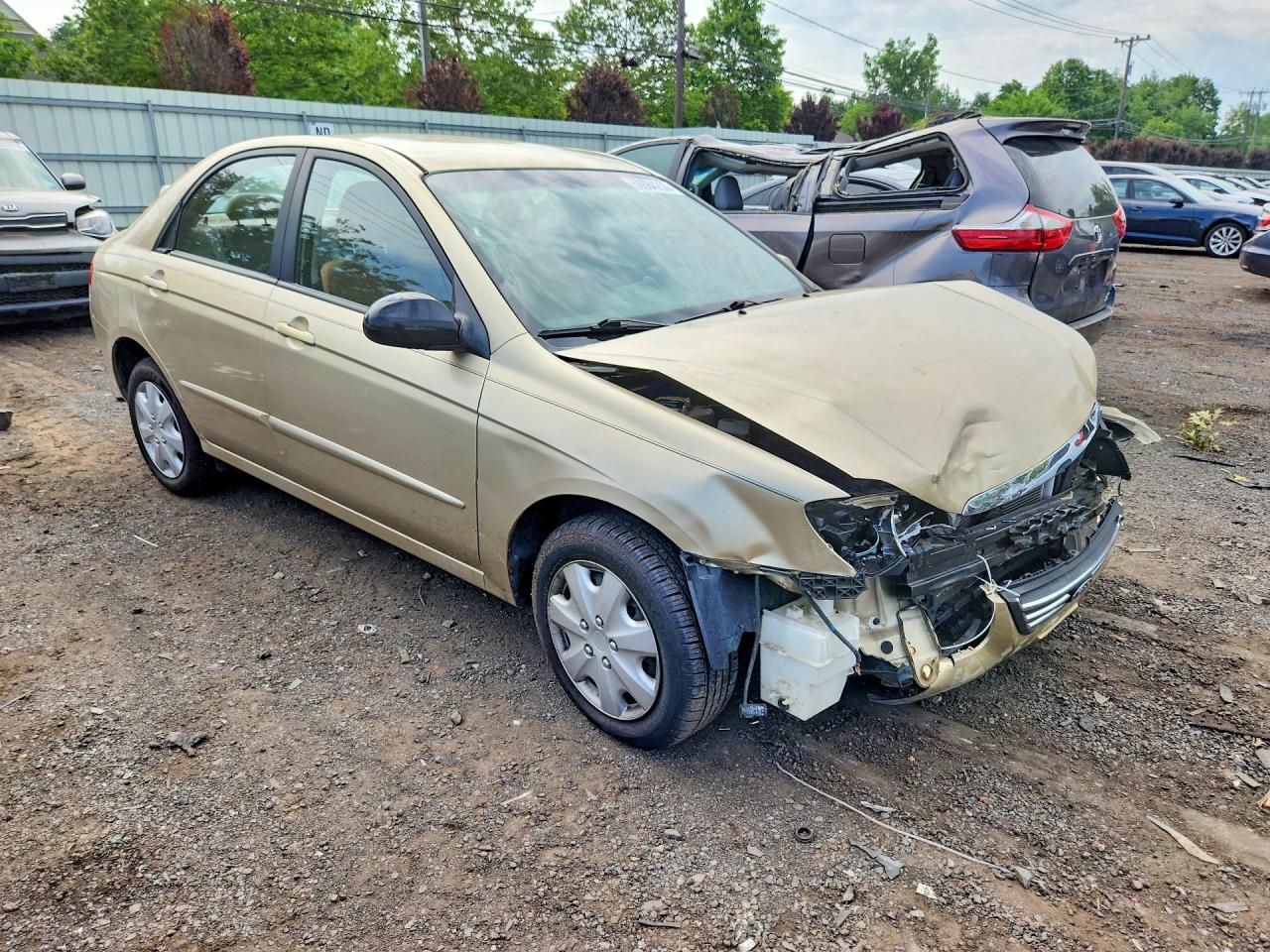 2009 Kia Spectra Ex Gold vin: KNAFE221095665832