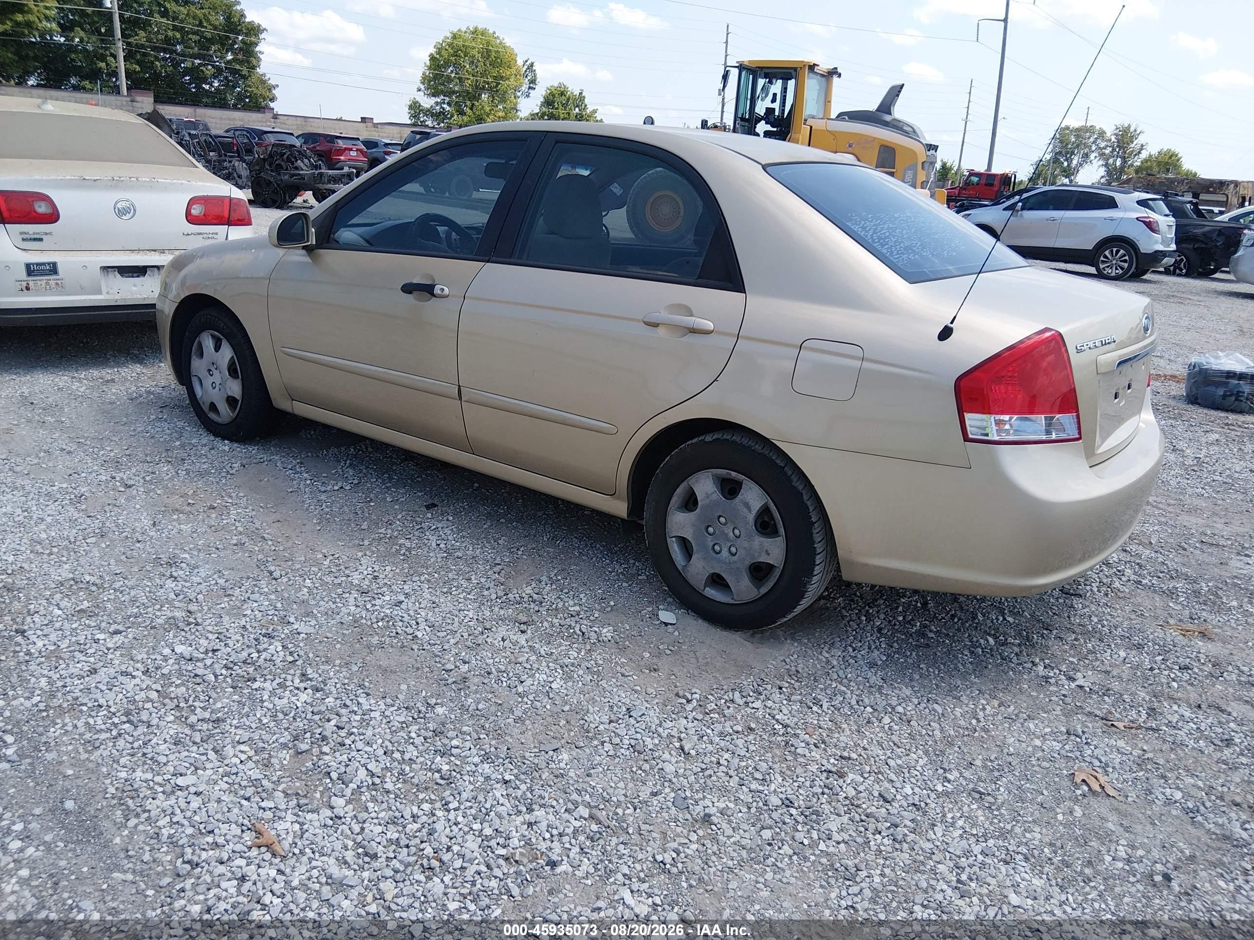 2009 Kia Spectra Ex Gold vin: KNAFE221295657571