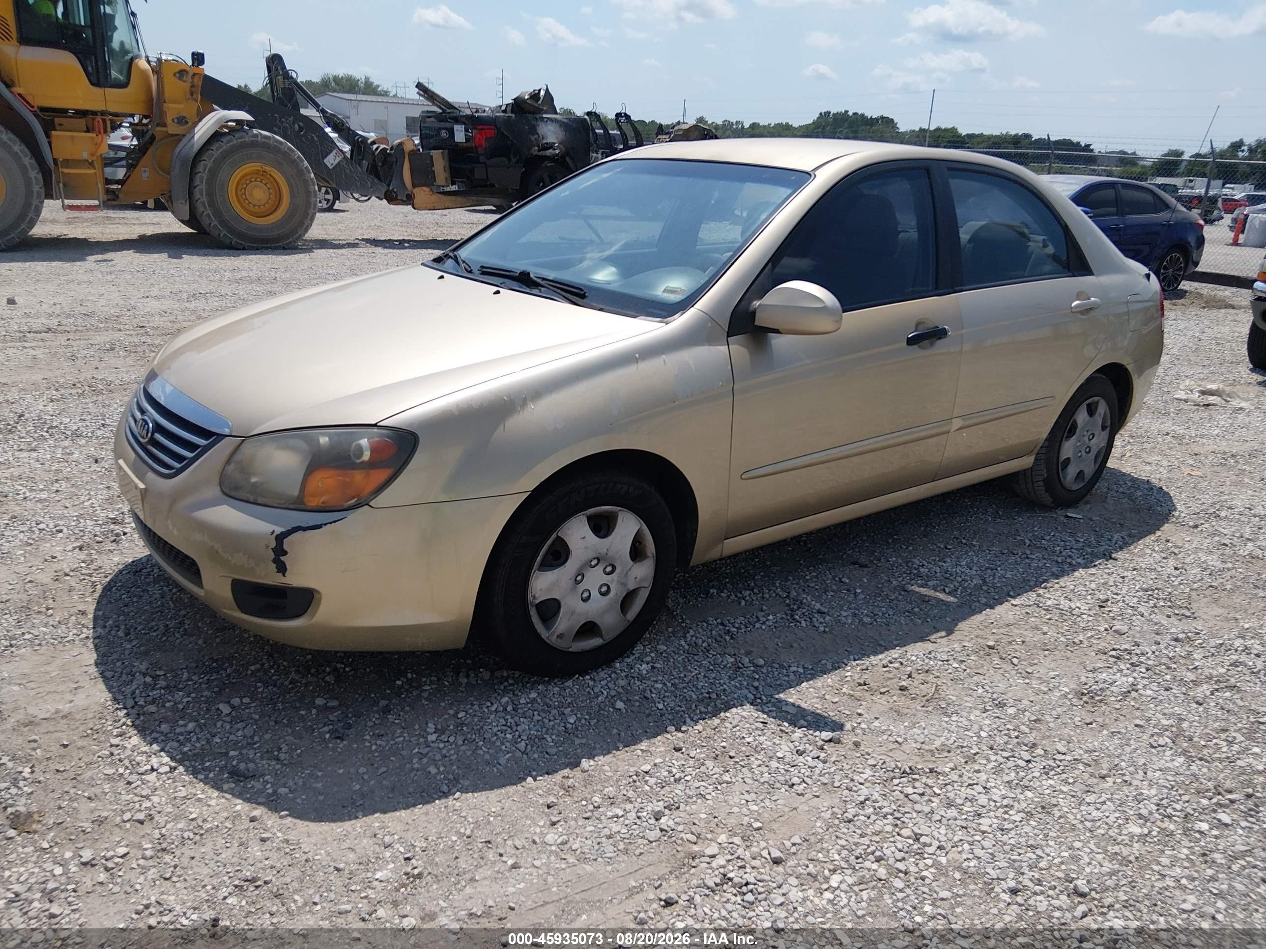 2009 Kia Spectra Ex Gold vin: KNAFE221295657571