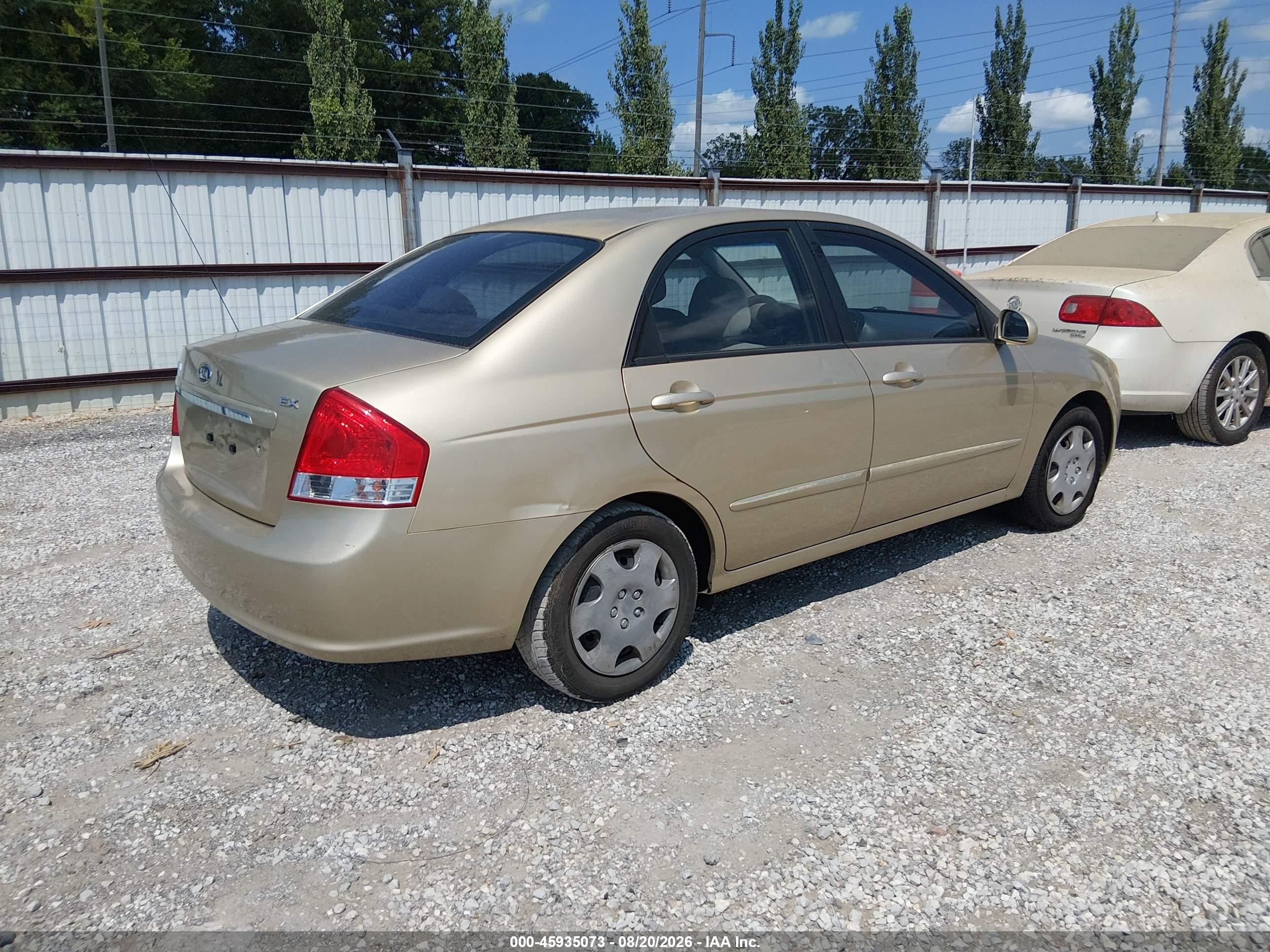 2009 Kia Spectra Ex Gold vin: KNAFE221295657571