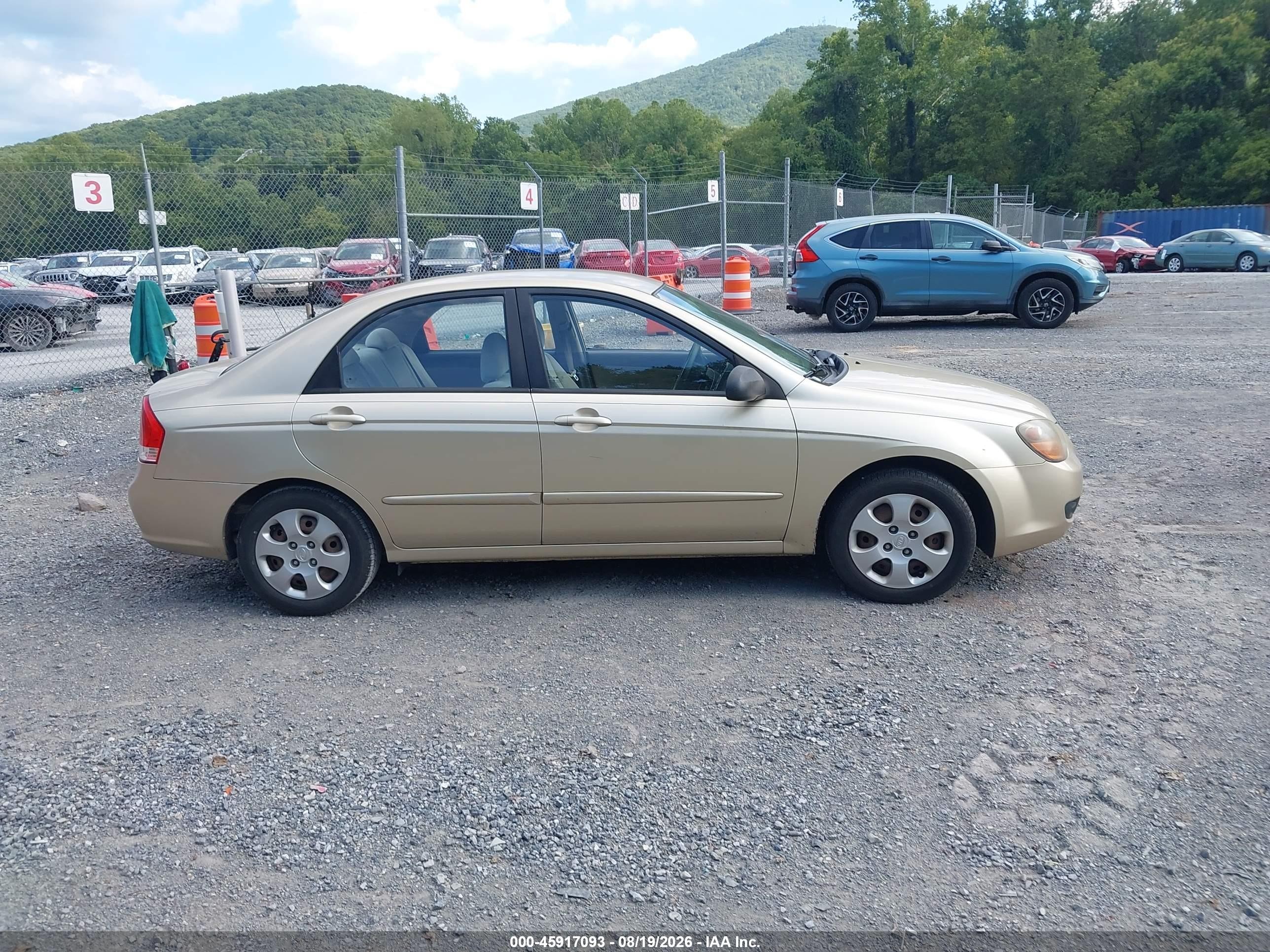 2009 Kia Spectra Ex Gold vin: KNAFE221395652220