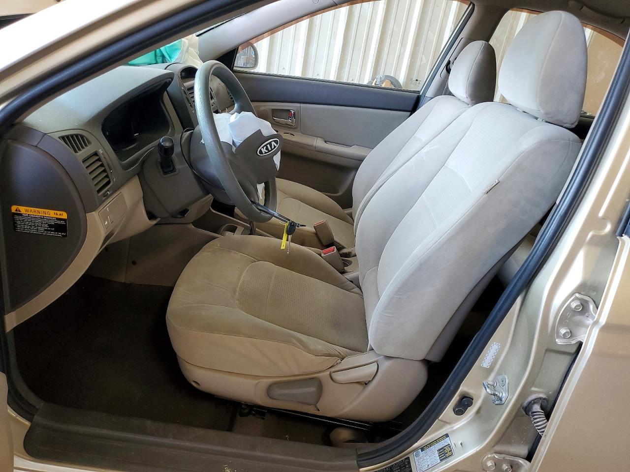 2009 Kia Spectra Lx Tan vin: KNAFE221995668664