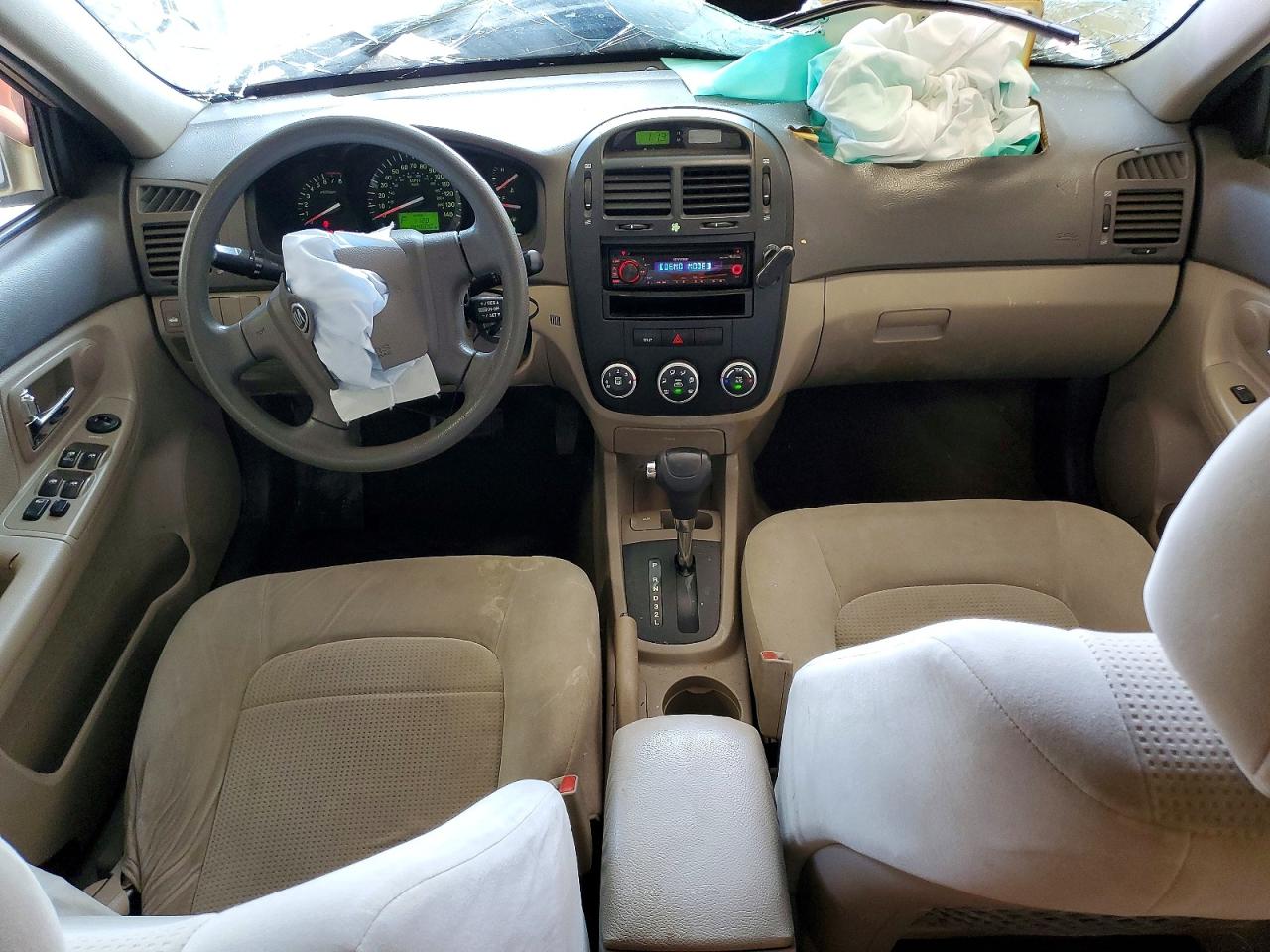 2009 Kia Spectra Lx Tan vin: KNAFE221995668664