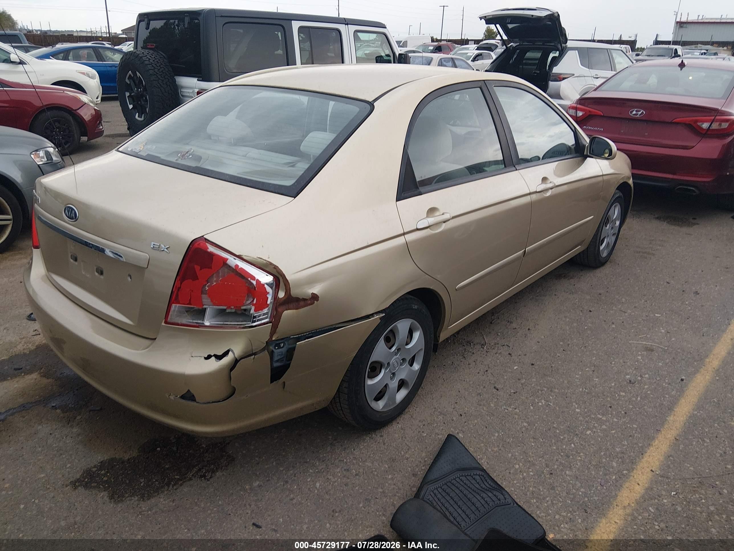 2009 Kia Spectra Ex Gold vin: KNAFE222295659782
