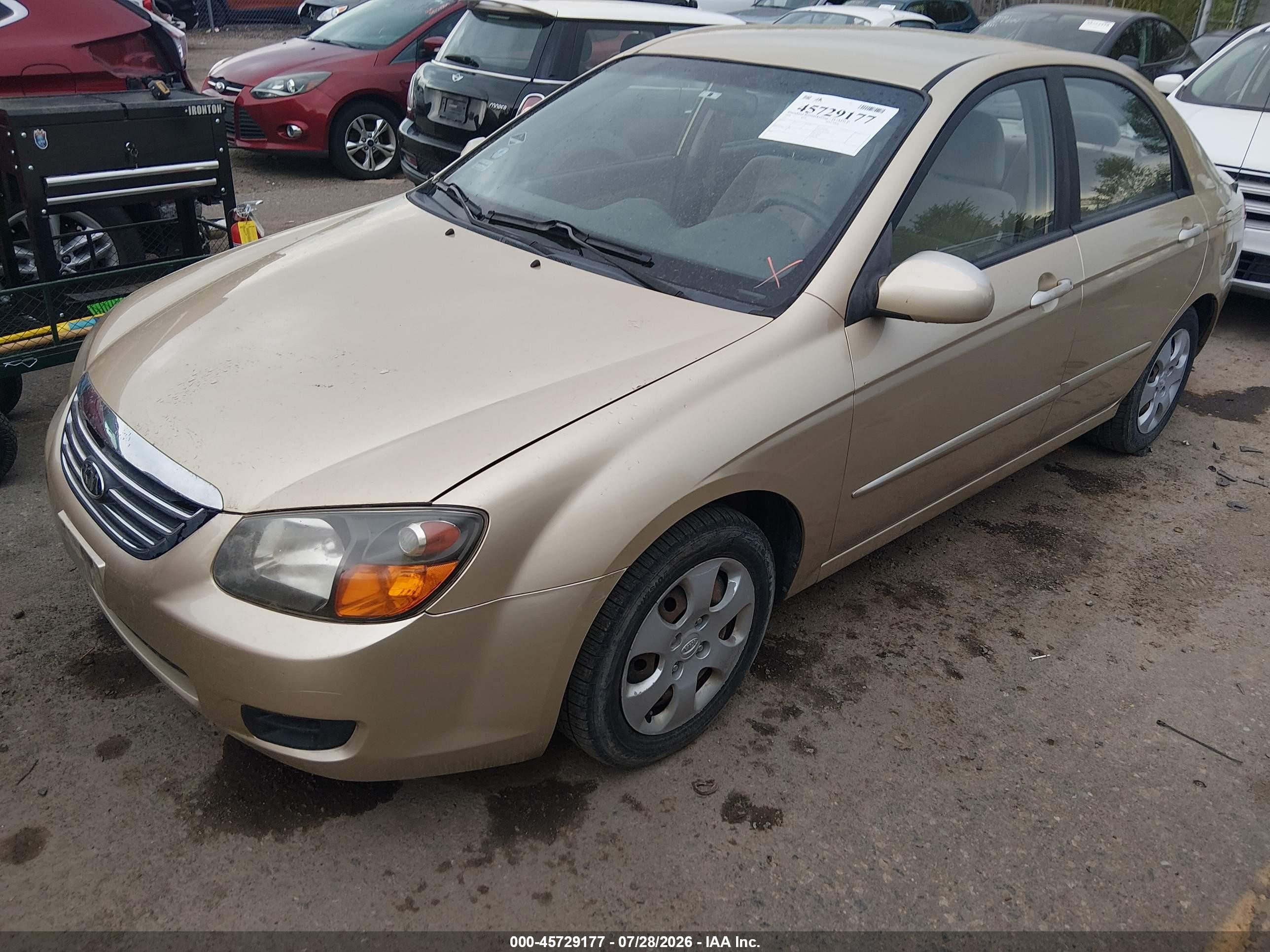 2009 Kia Spectra Ex Gold vin: KNAFE222295659782
