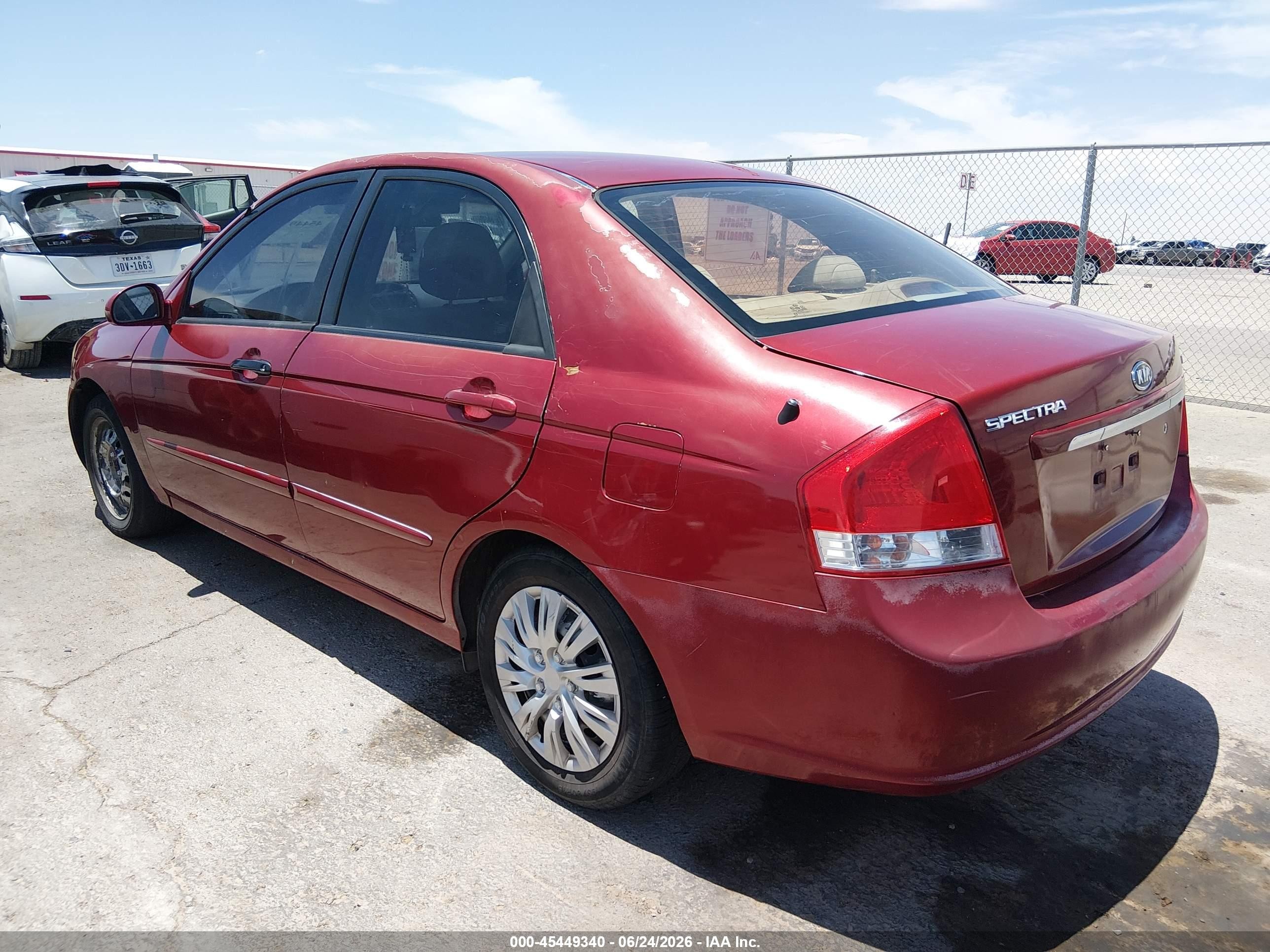 2009 Kia Spectra Ex Maroon vin: KNAFE222395638424