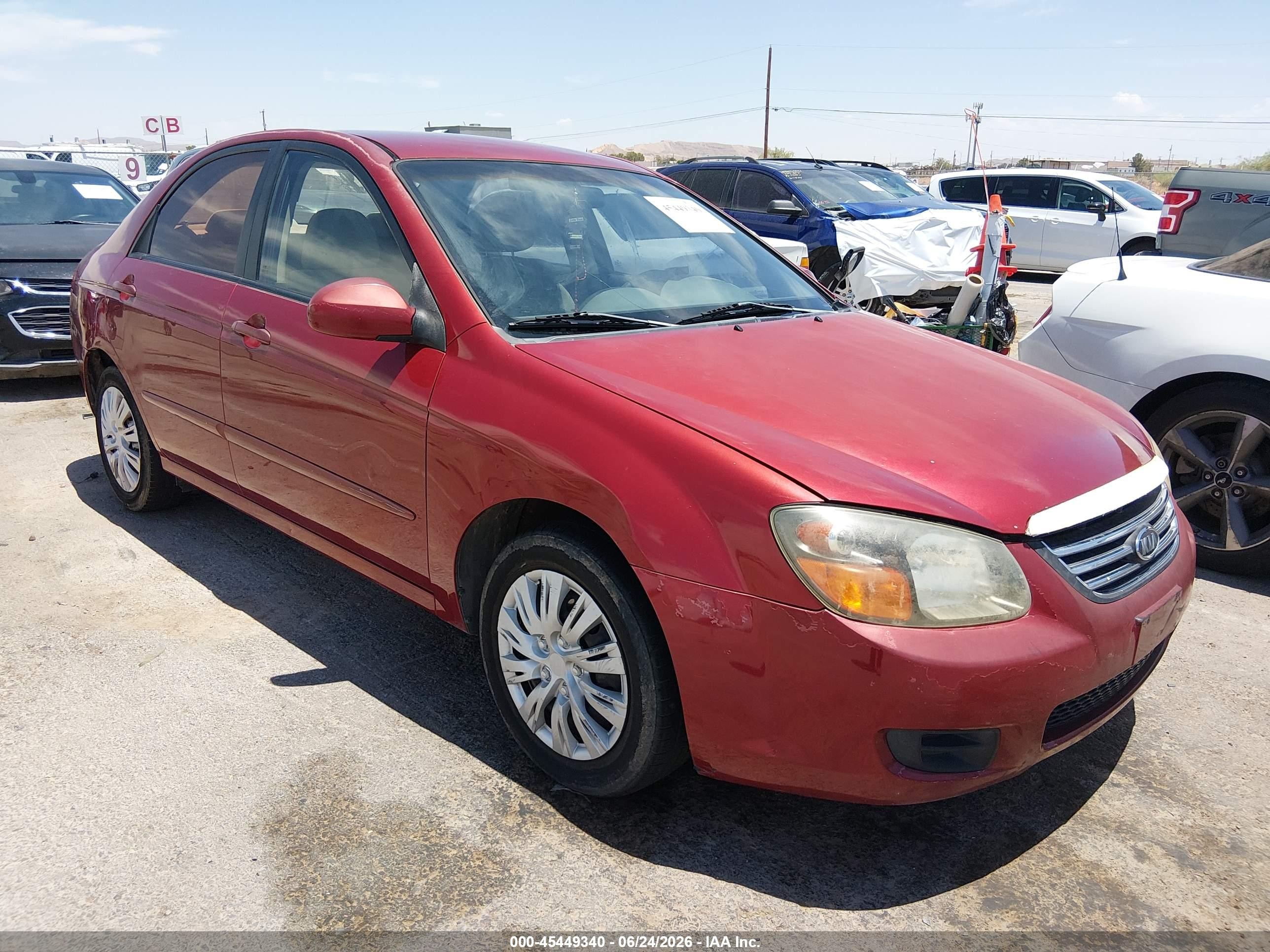 2009 Kia Spectra Ex Maroon vin: KNAFE222395638424