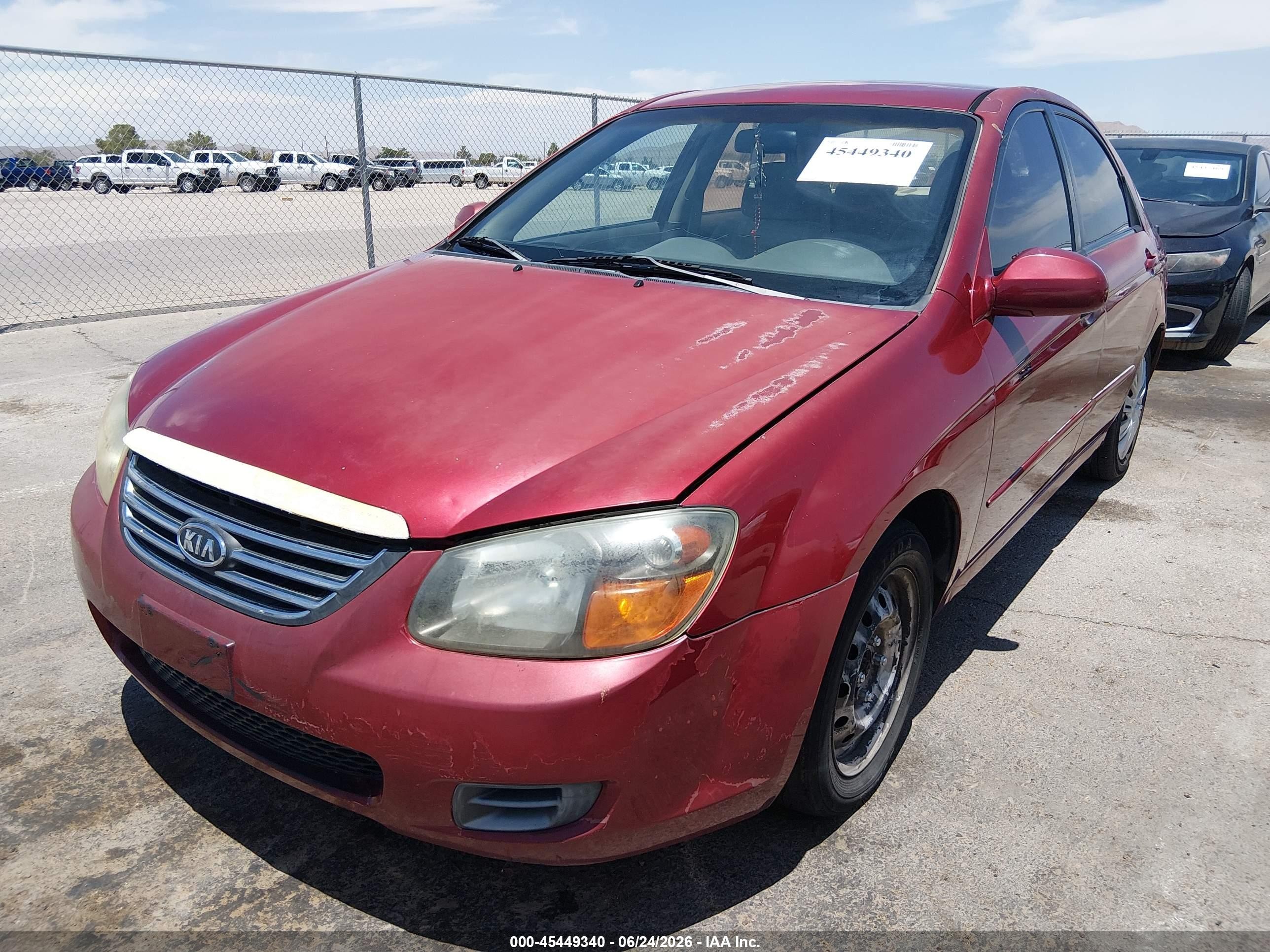 2009 Kia Spectra Ex Maroon vin: KNAFE222395638424