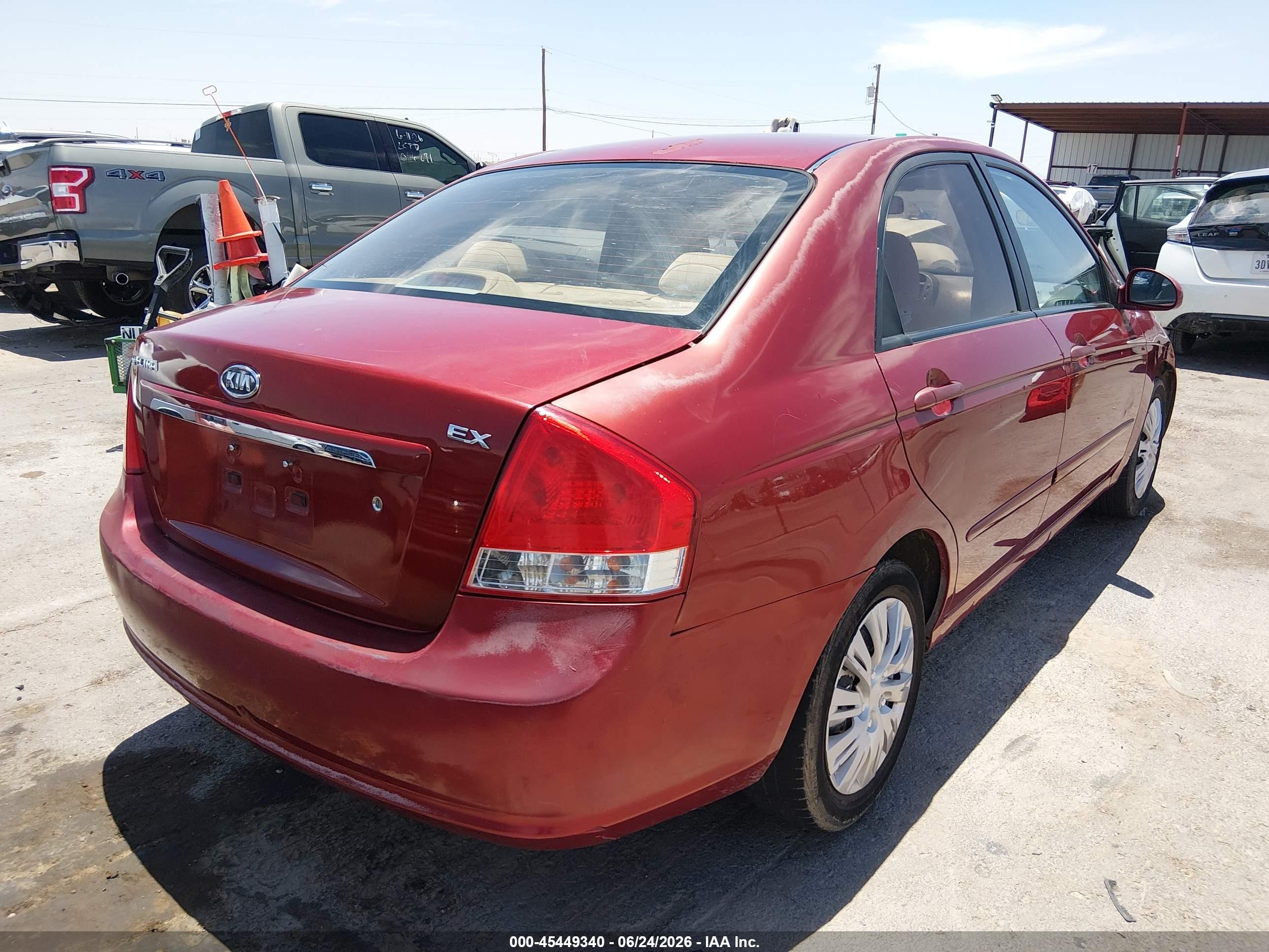 2009 Kia Spectra Ex Maroon vin: KNAFE222395638424