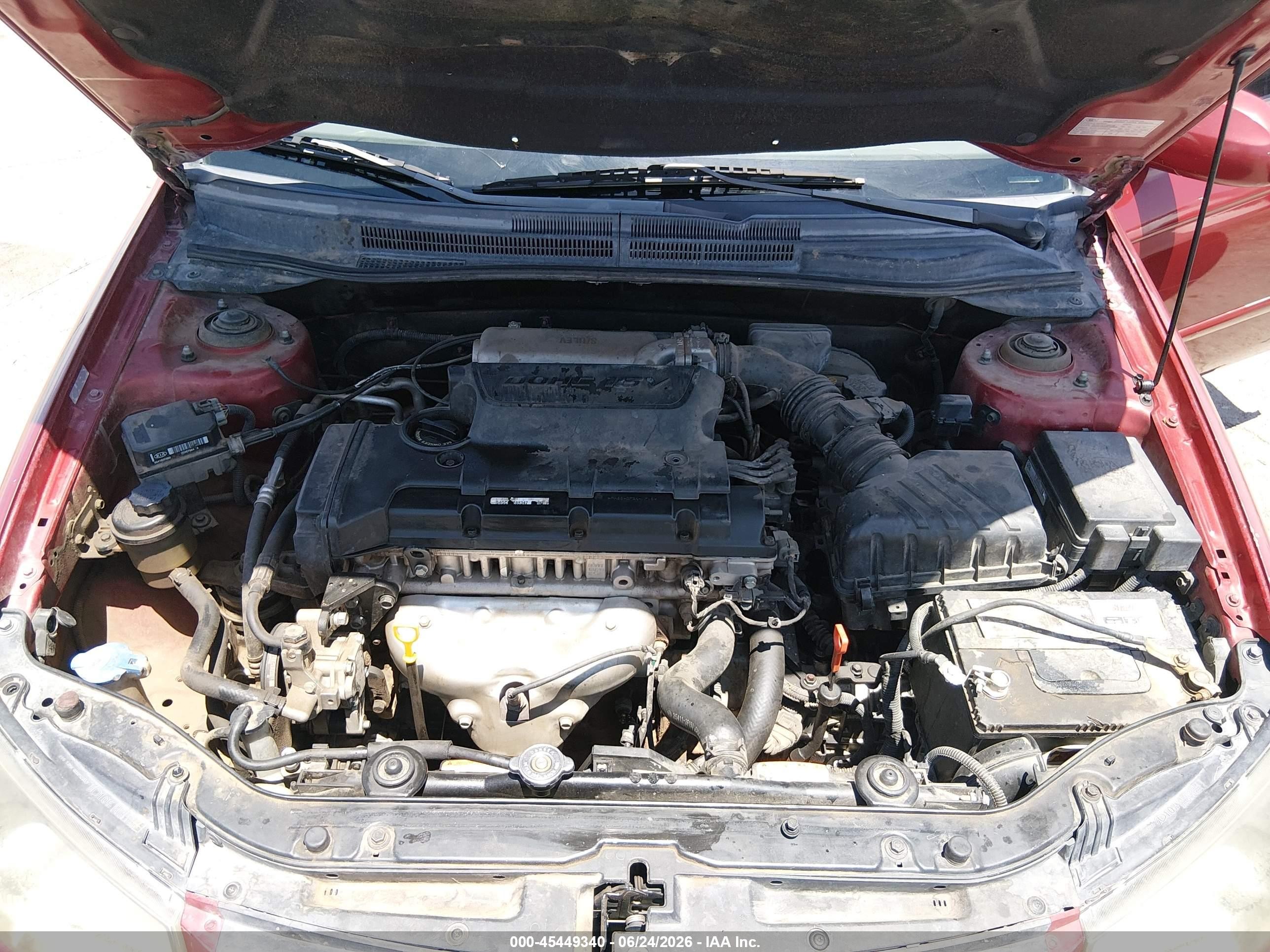 2009 Kia Spectra Ex Maroon vin: KNAFE222395638424