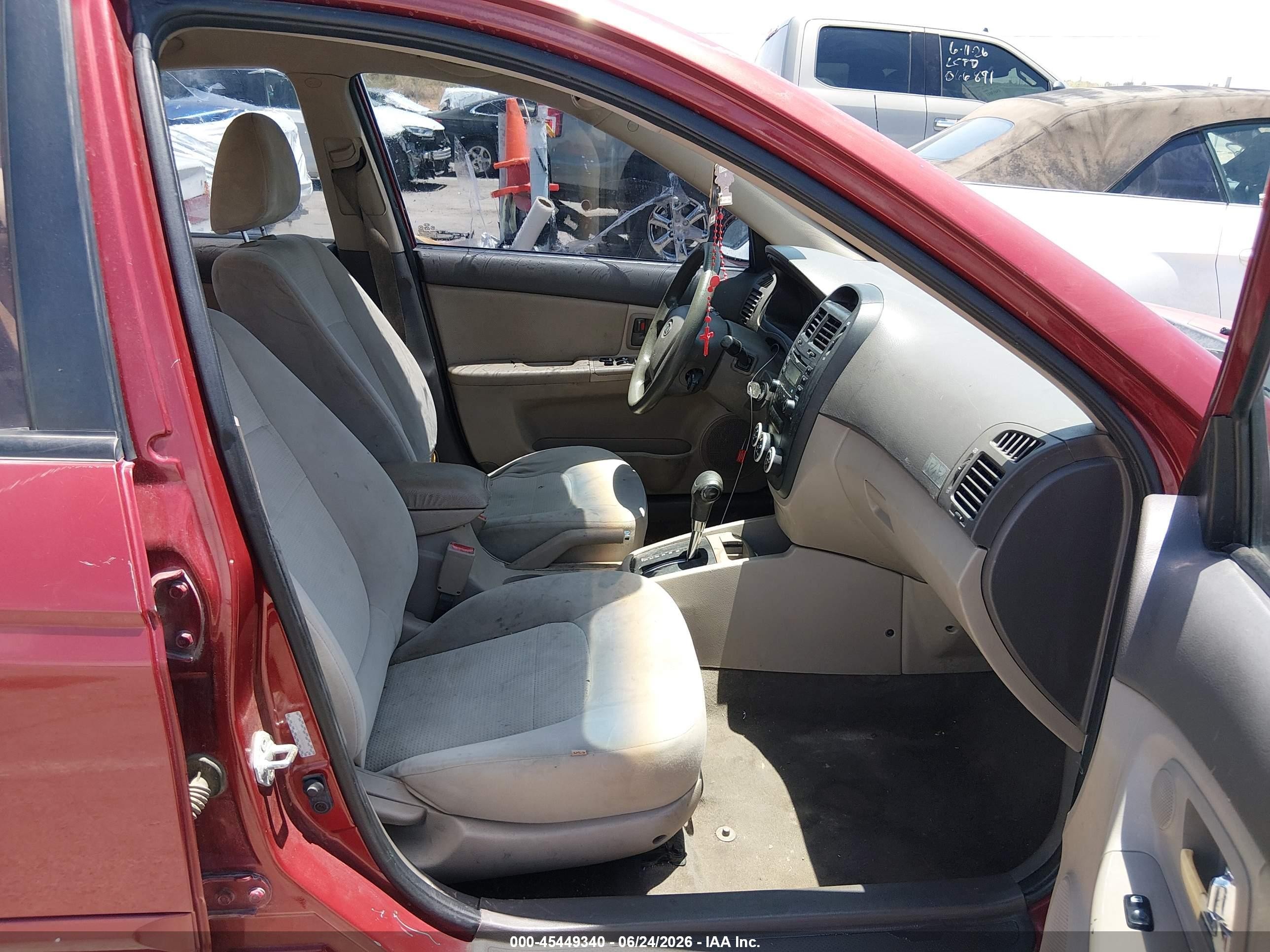 2009 Kia Spectra Ex Maroon vin: KNAFE222395638424