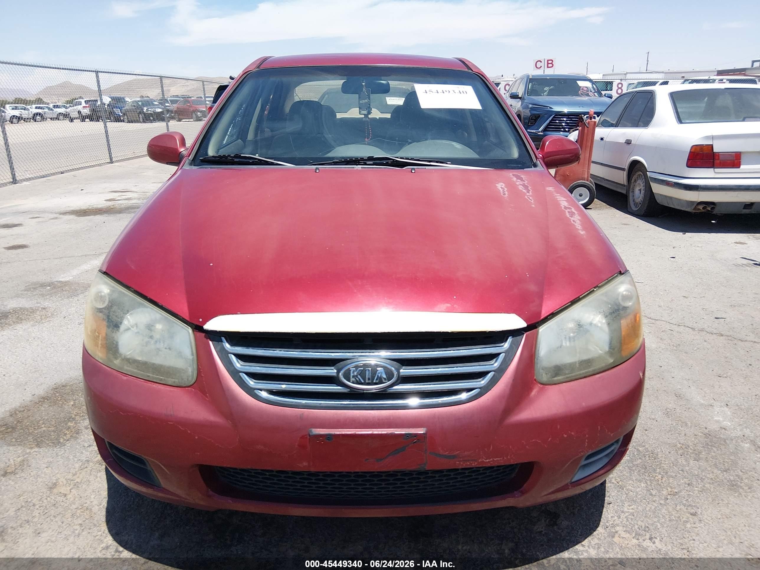 2009 Kia Spectra Ex Maroon vin: KNAFE222395638424