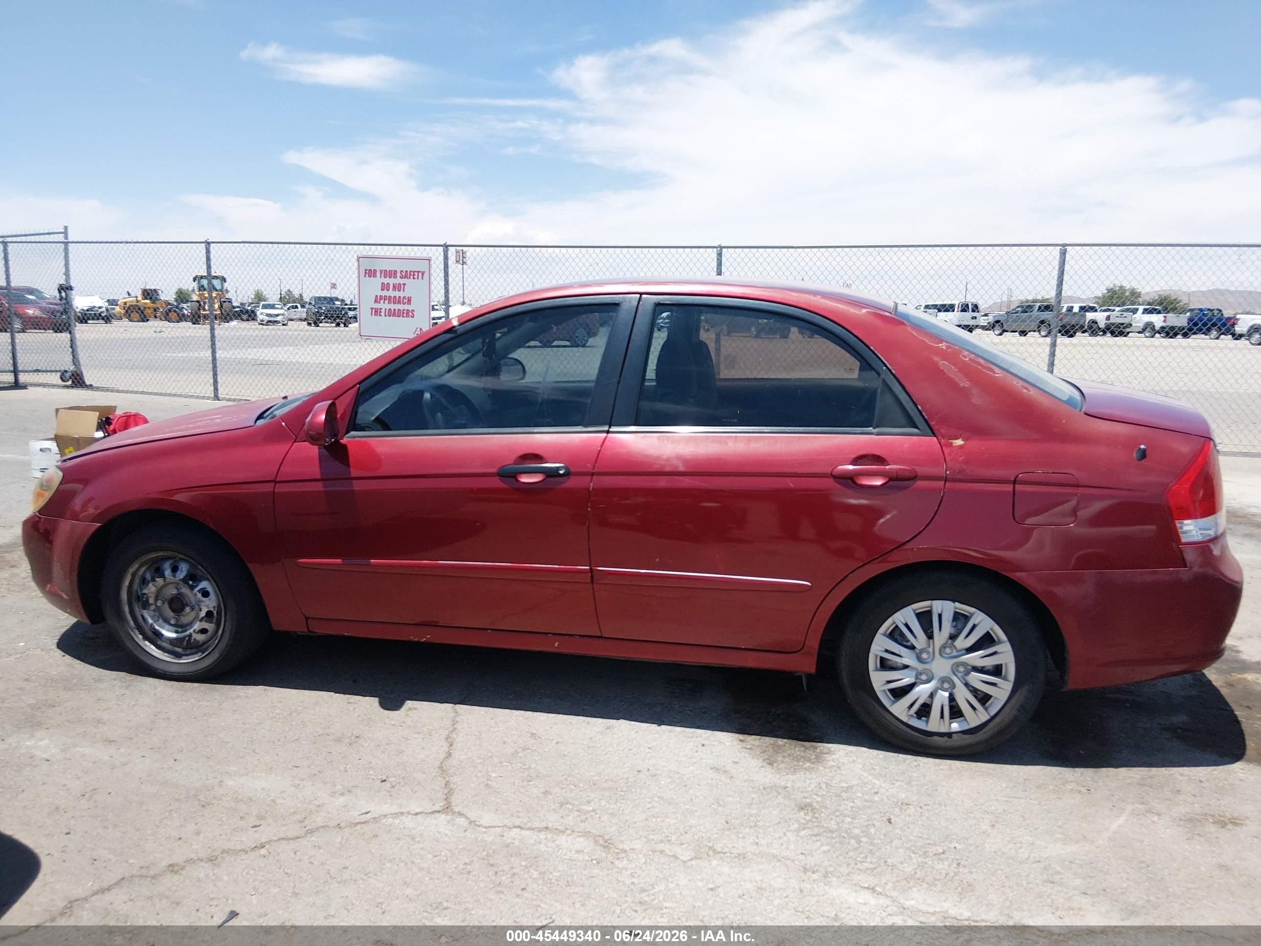 2009 Kia Spectra Ex Maroon vin: KNAFE222395638424