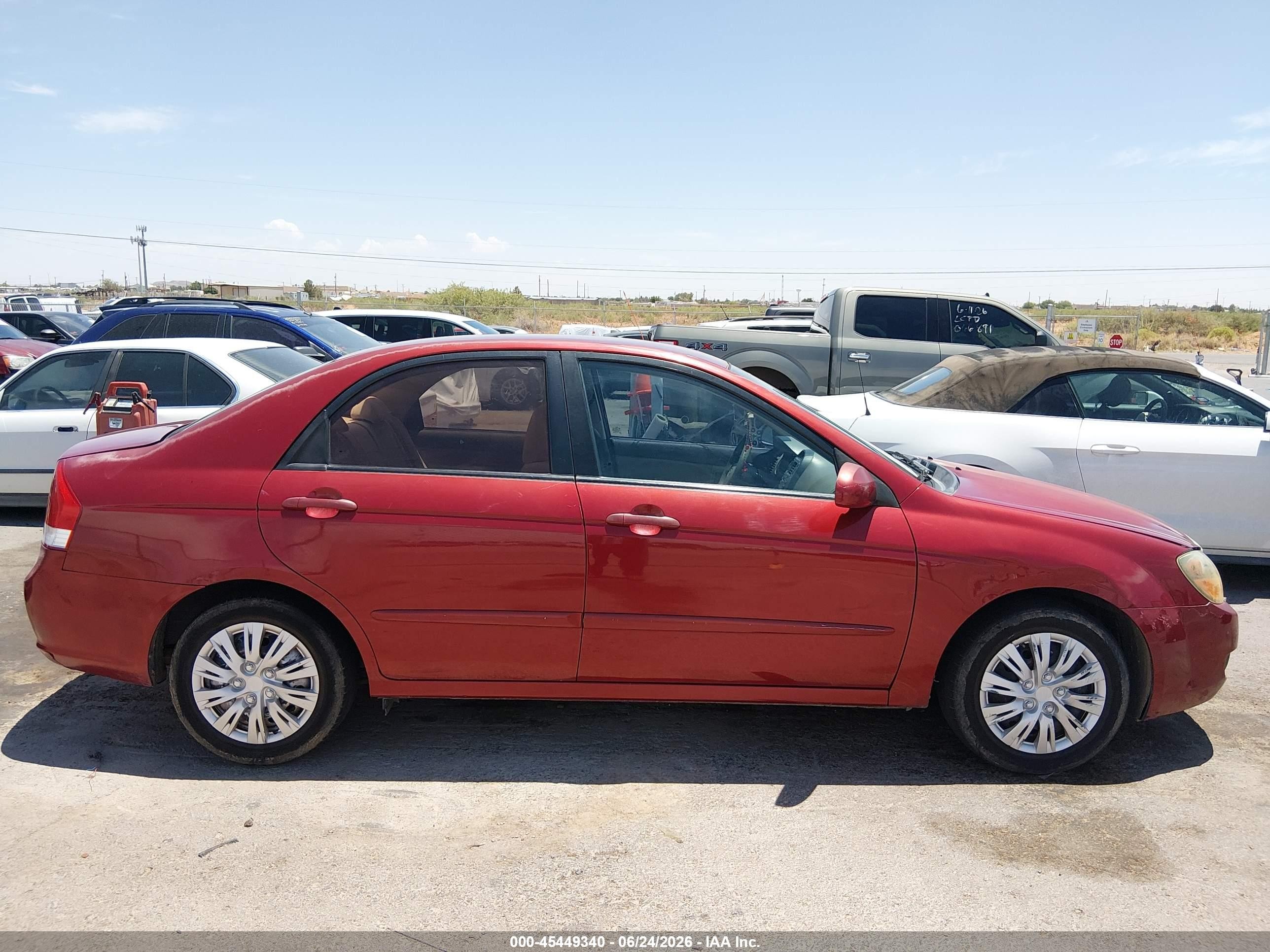 2009 Kia Spectra Ex Maroon vin: KNAFE222395638424