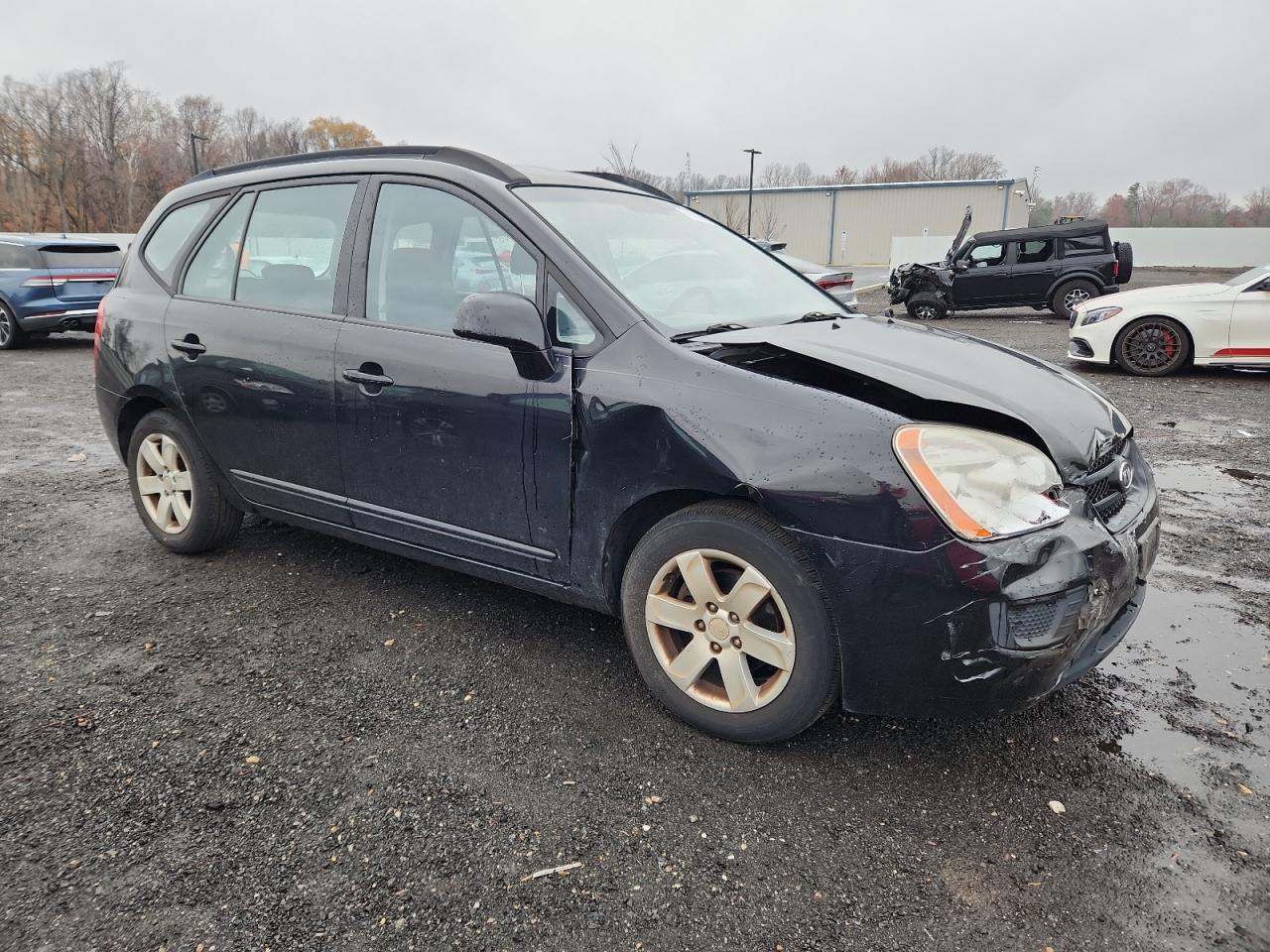 2008 Kia Rondo Base Black vin: KNAFG525687171475