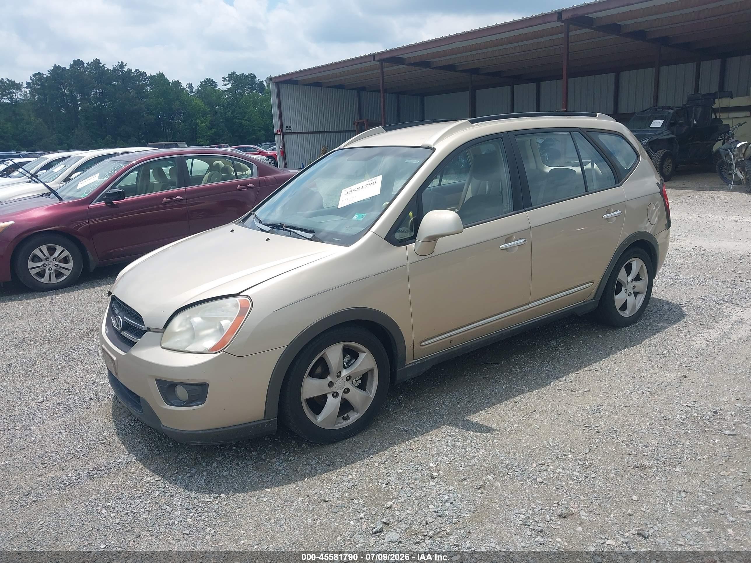 2007 Kia Rondo Ex V6 Gold vin: KNAFG526X77047815