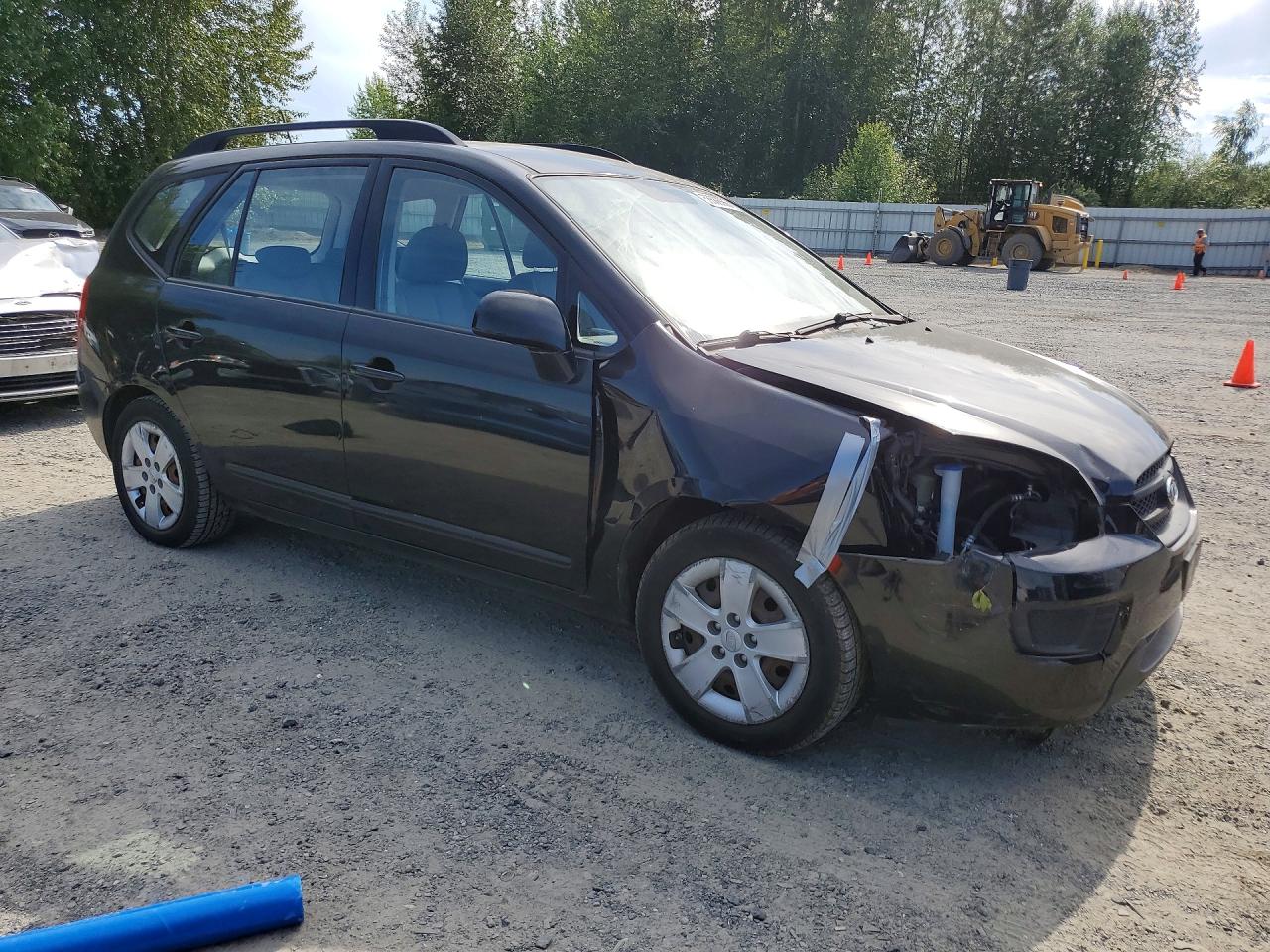2009 Kia Rondo Base Черный vin: KNAFG528297224555
