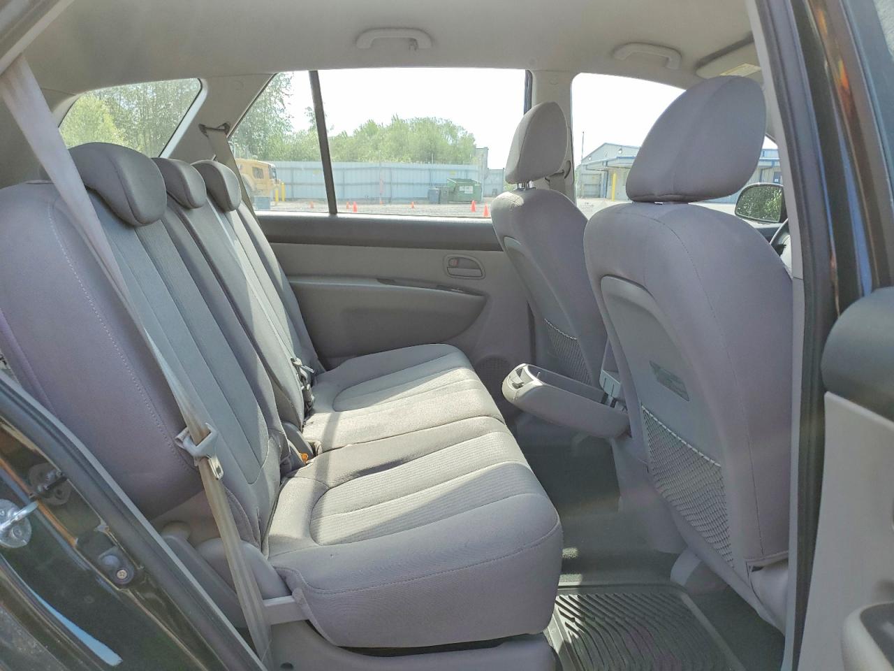 2009 Kia Rondo Base Черный vin: KNAFG528297224555
