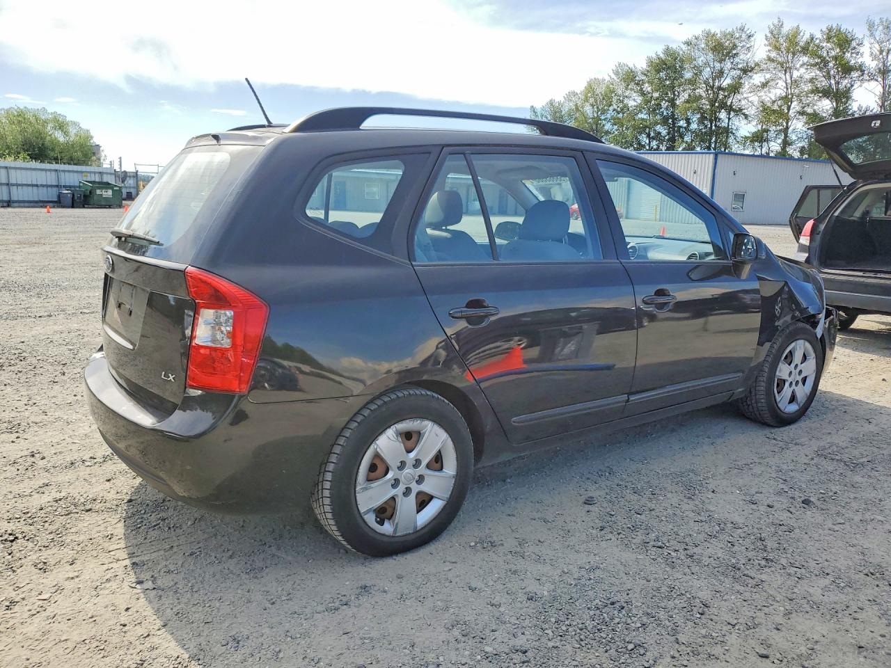 2009 Kia Rondo Base Черный vin: KNAFG528297224555