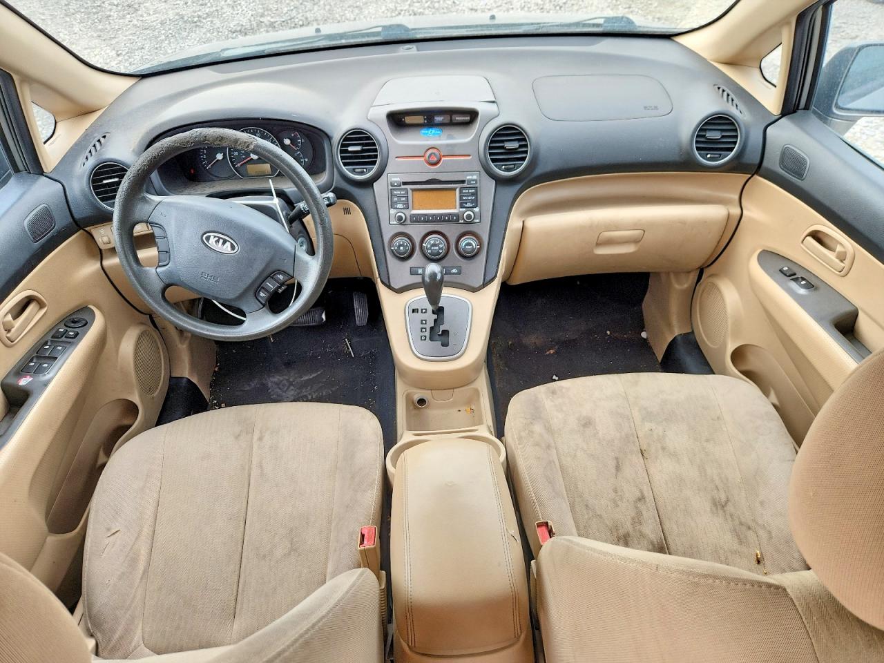 2009 Kia Rondo Base Золотой vin: KNAFG528297257796
