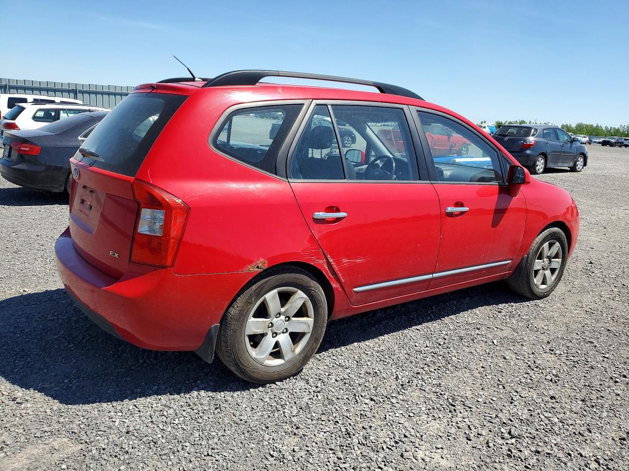 2009 Kia Rondo Base Красный vin: KNAFG528397275787
