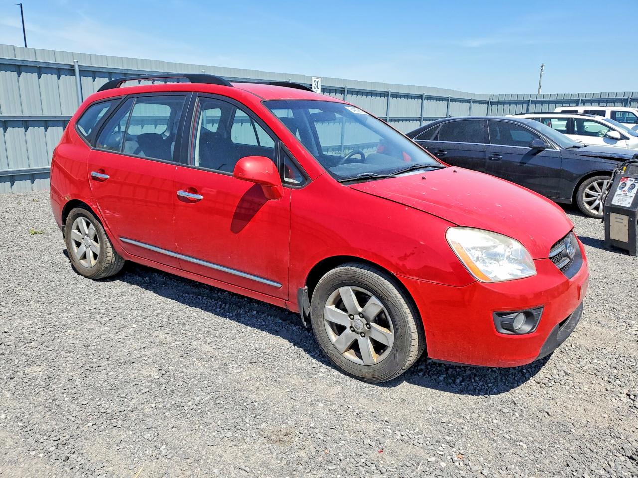 2009 Kia Rondo Base Красный vin: KNAFG528397275787