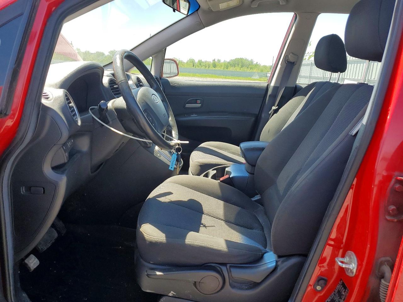 2009 Kia Rondo Base Красный vin: KNAFG528397275787