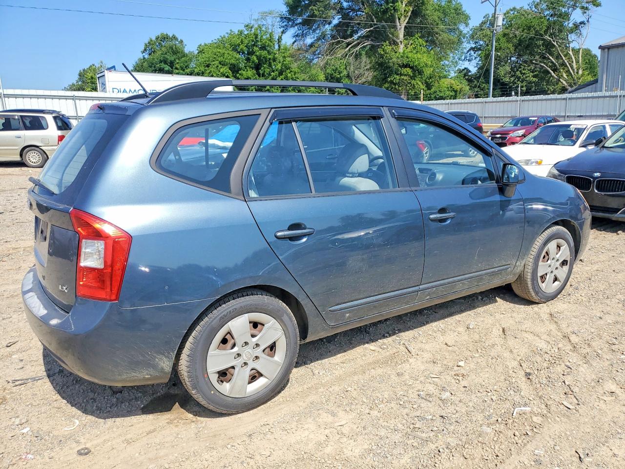 2009 Kia Rondo Base Blue vin: KNAFG528597255301