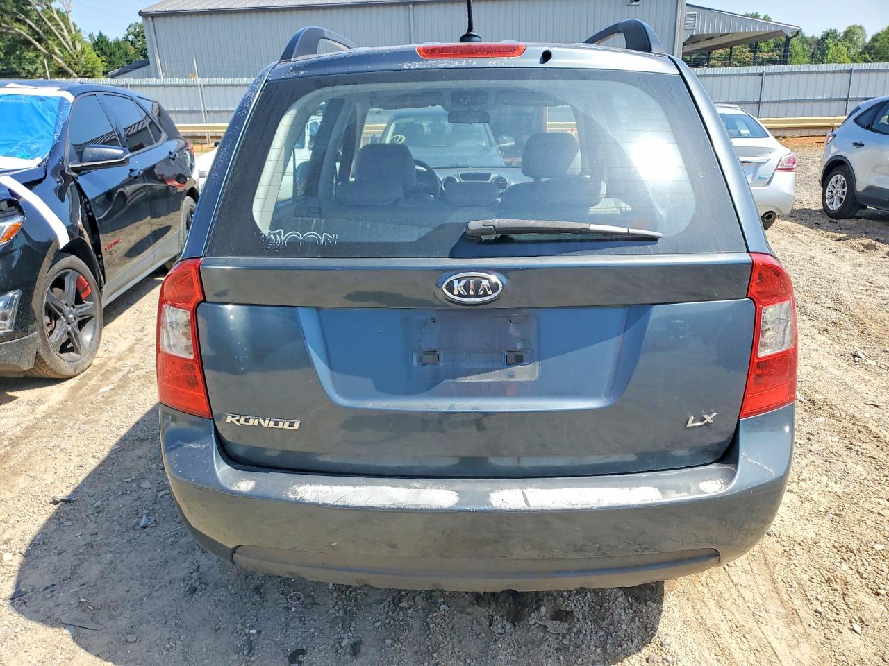 2009 Kia Rondo Base Blue vin: KNAFG528597255301