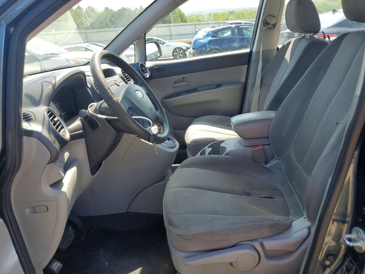 2009 Kia Rondo Base Blue vin: KNAFG528597255301