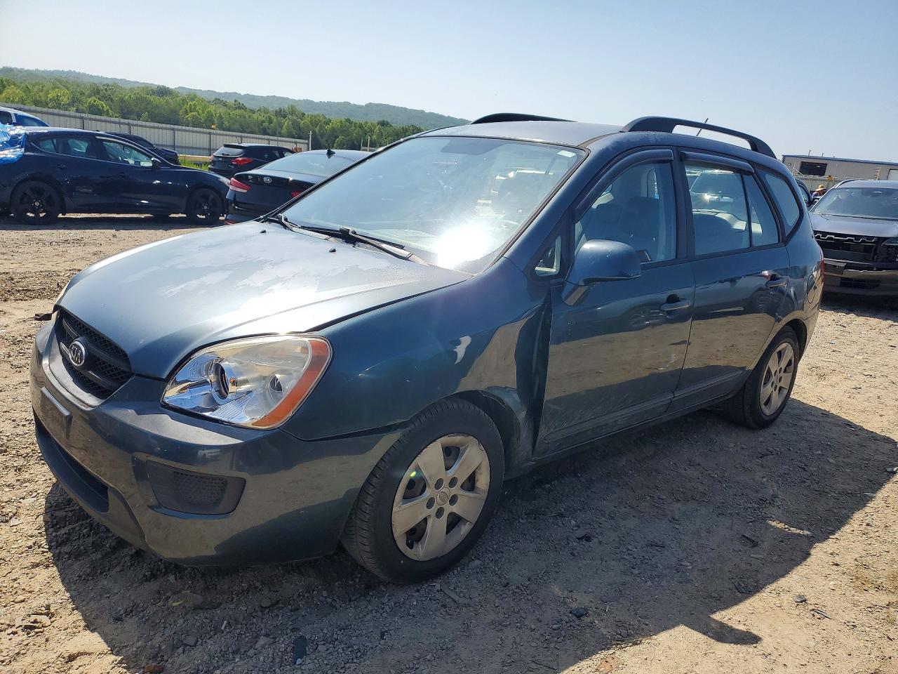 2009 Kia Rondo Base Blue vin: KNAFG528597255301