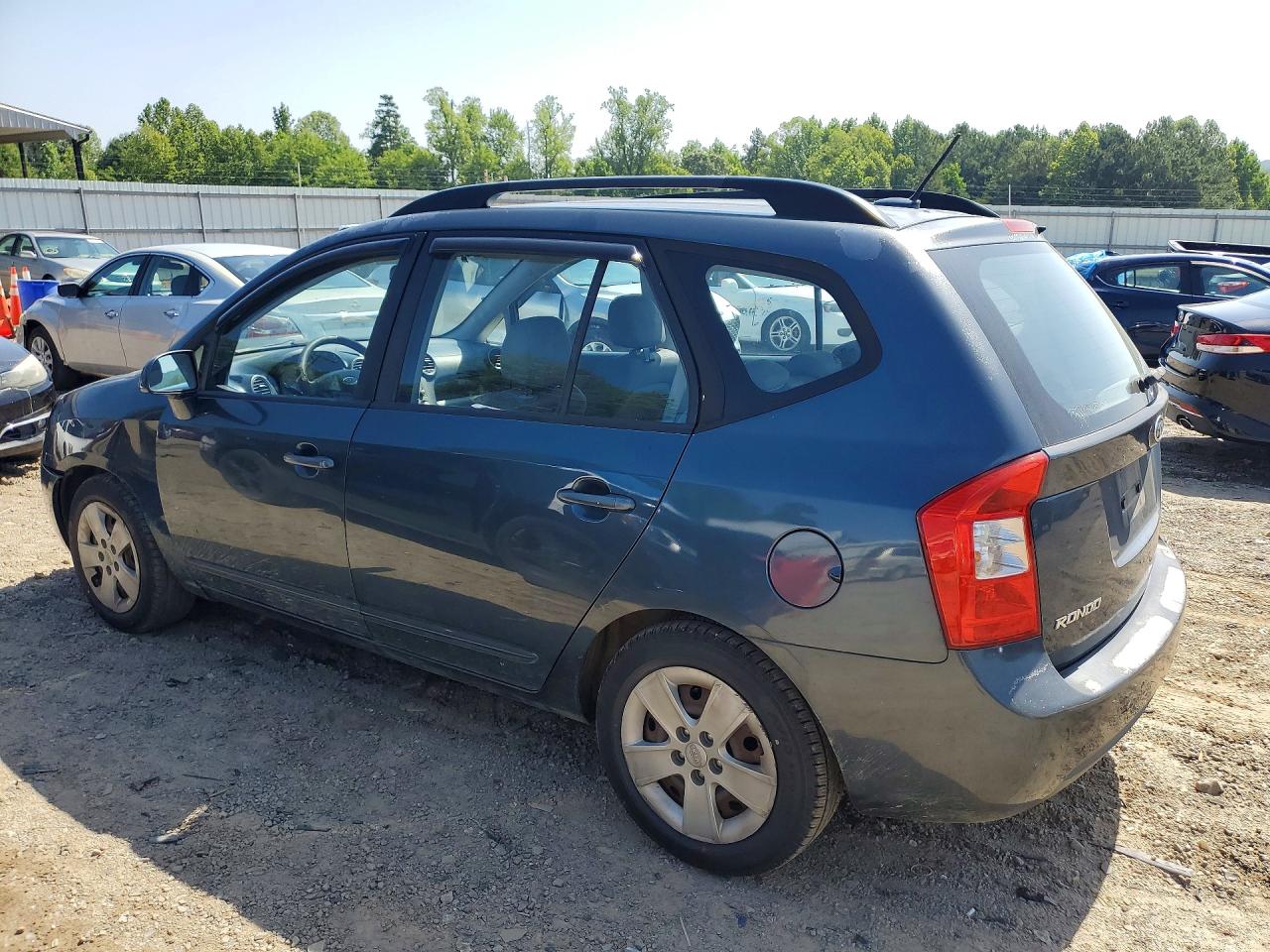 2009 Kia Rondo Base Blue vin: KNAFG528597255301