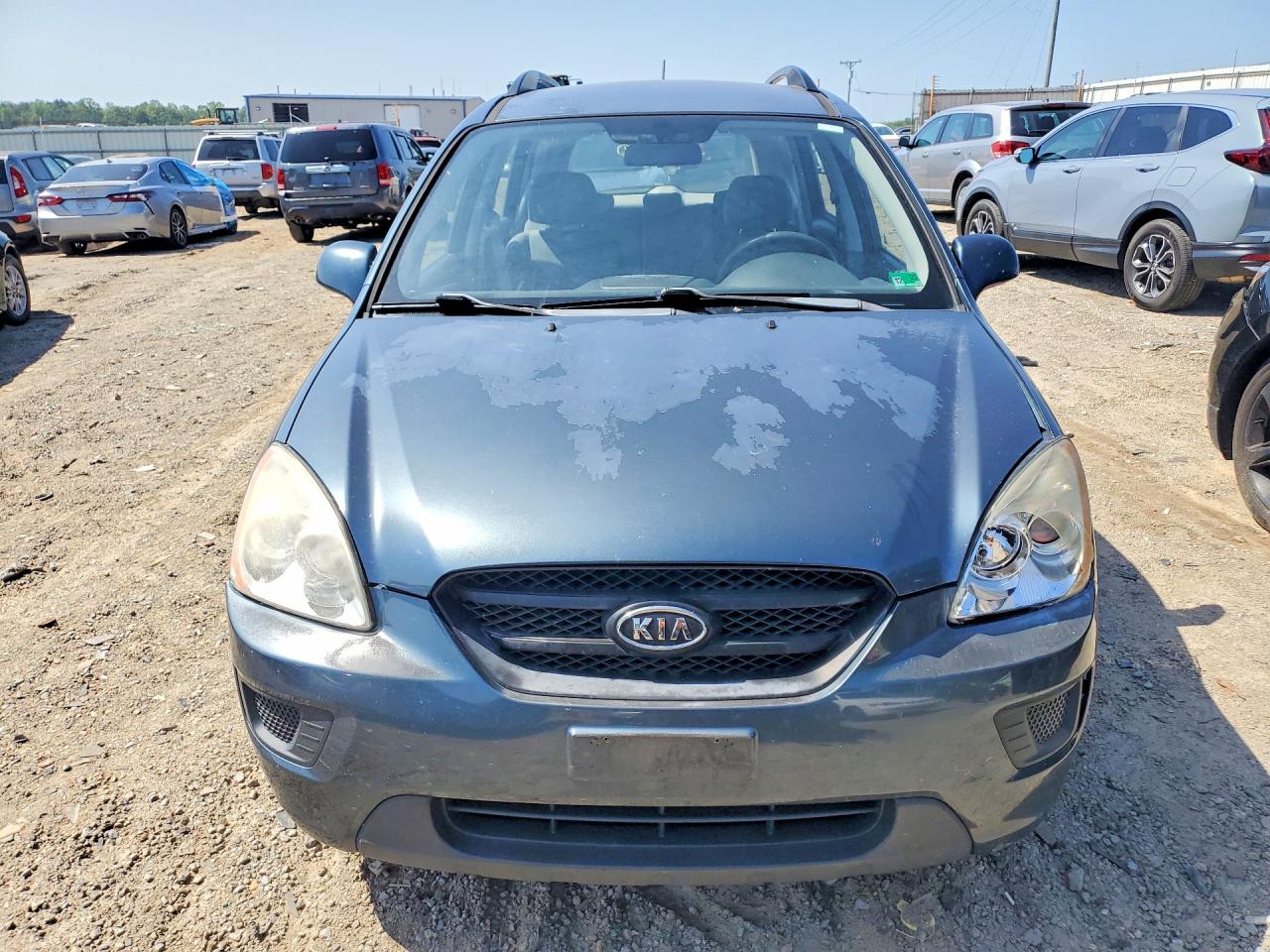 2009 Kia Rondo Base Blue vin: KNAFG528597255301