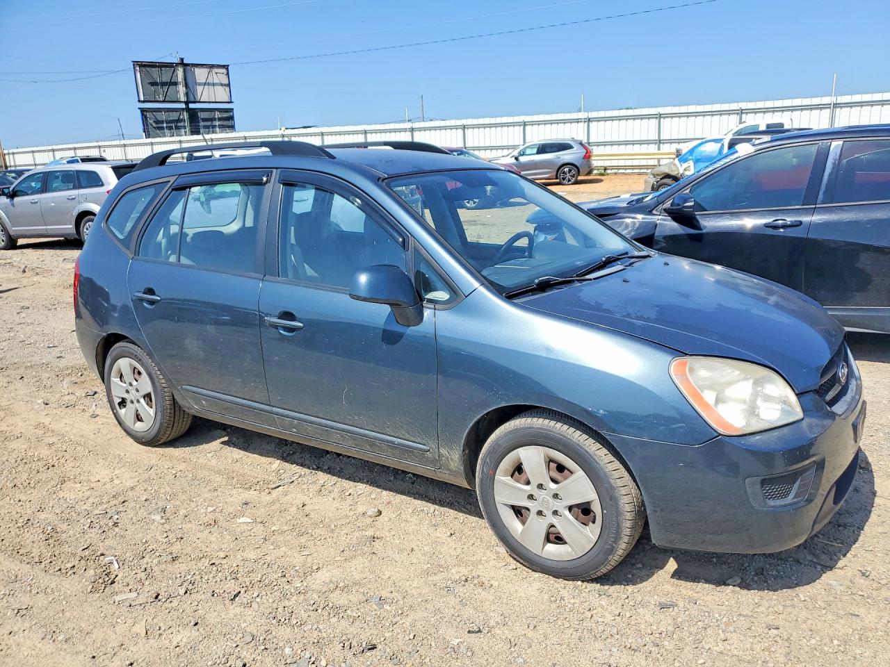 2009 Kia Rondo Base Blue vin: KNAFG528597255301