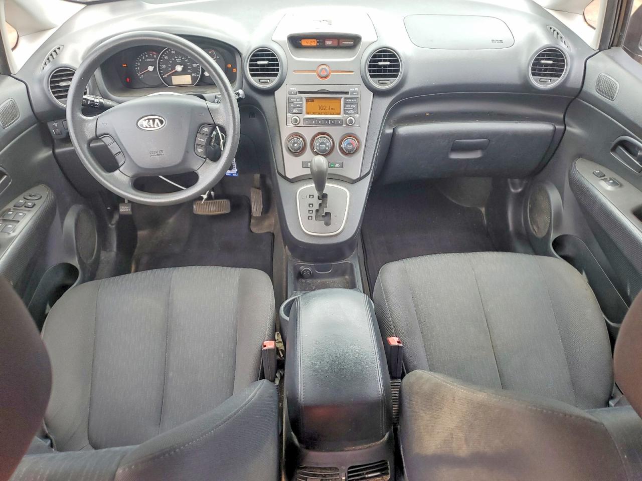 2009 Kia Rondo Base Коричневый vin: KNAFG528797266171