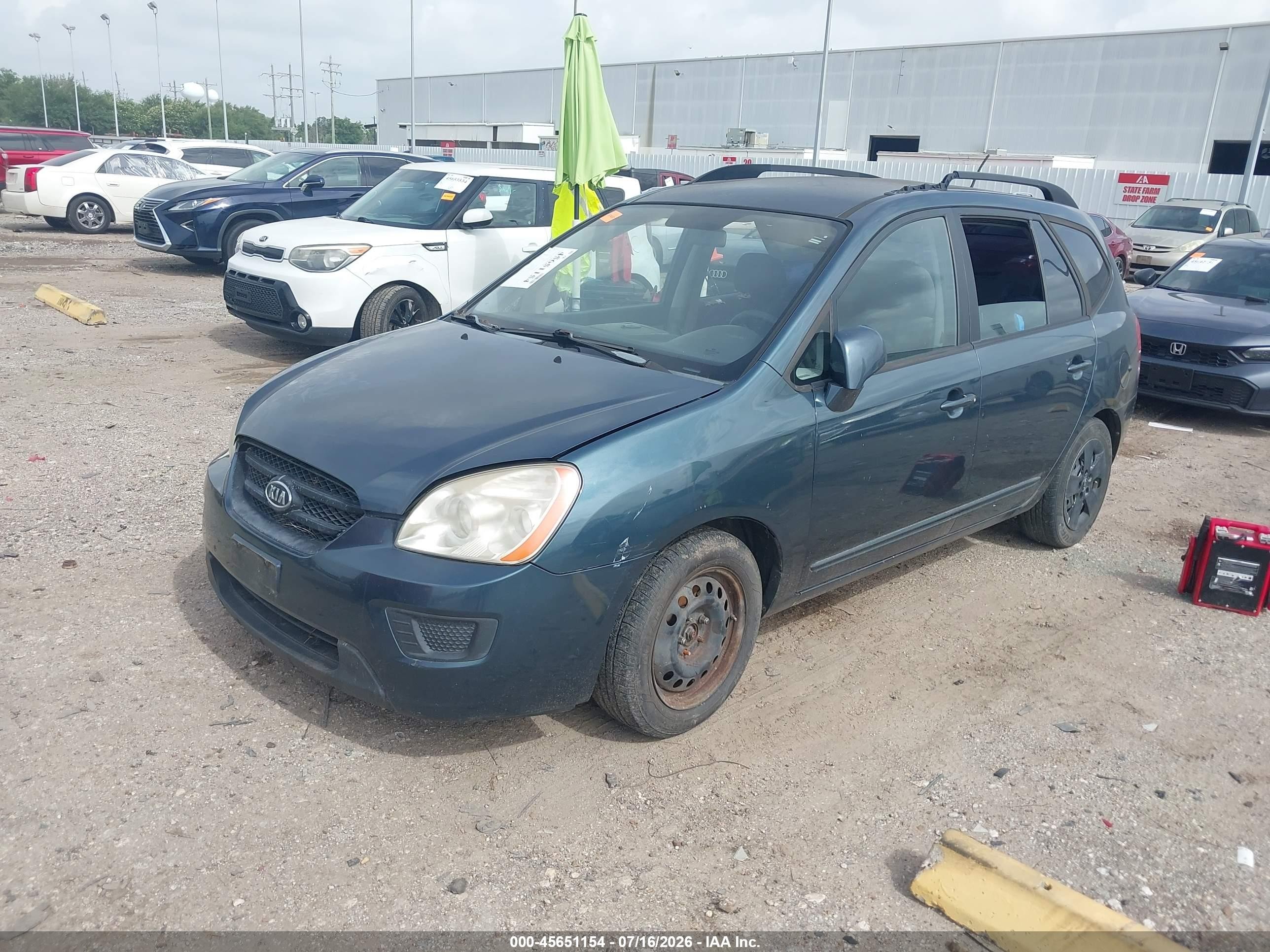 2009 Kia Rondo Lx Серый vin: KNAFG528897238105