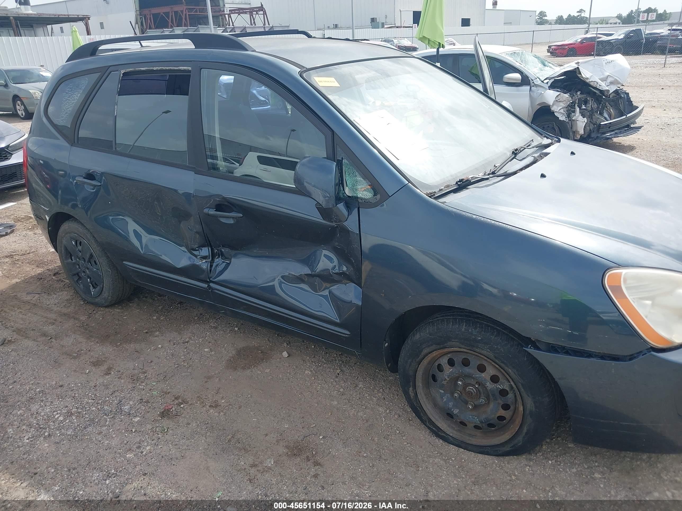 2009 Kia Rondo Lx Серый vin: KNAFG528897238105