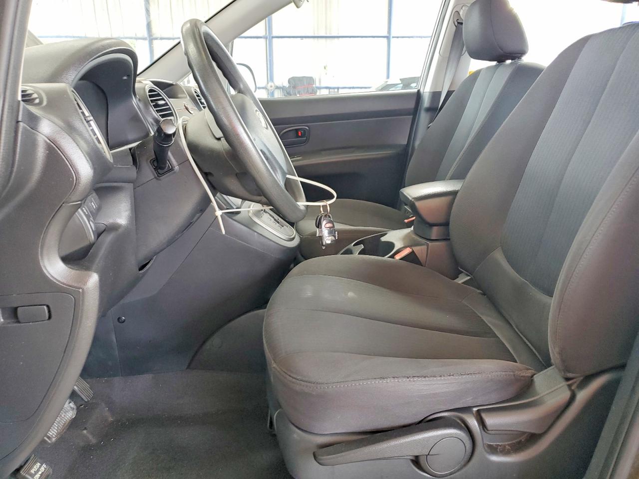 2009 Kia Rondo Base Brown vin: KNAFG528997264597