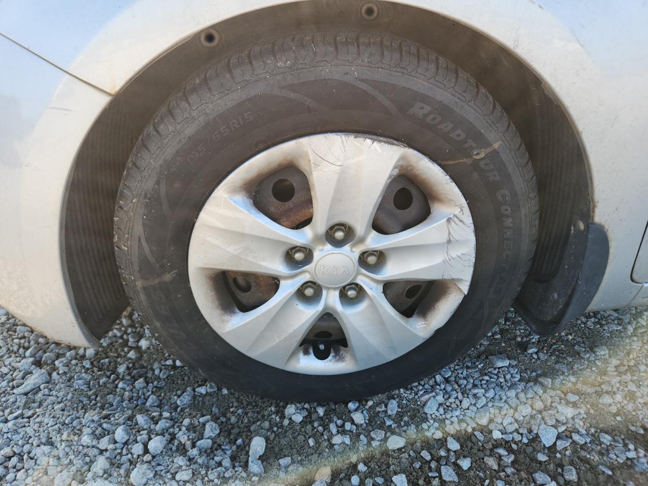2015 Kia Forte Lx Silver vin: KNAFK4A60F5346587 Damage: Left Front Wheel Cover, Broken, Replacement Required
