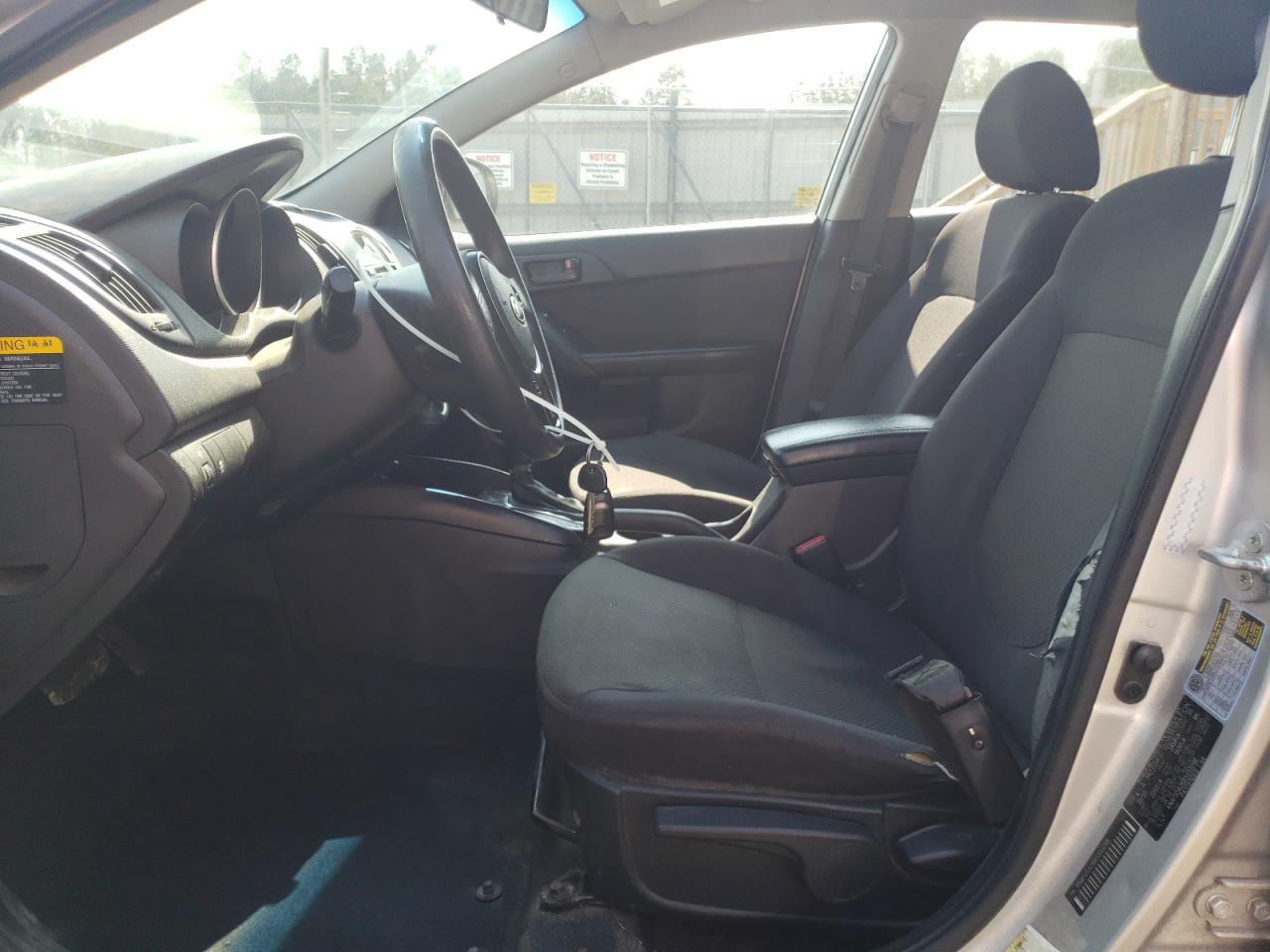 2011 Kia Forte5 Ex Silver vin: KNAFU5A26B5333298 Damage: Left Front Seat, Torn, 7 To 8 Inches