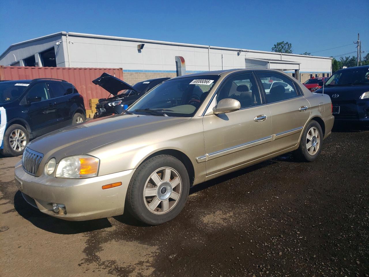 2003 Kia Optima Lx Tan vin: KNAGD126135204482