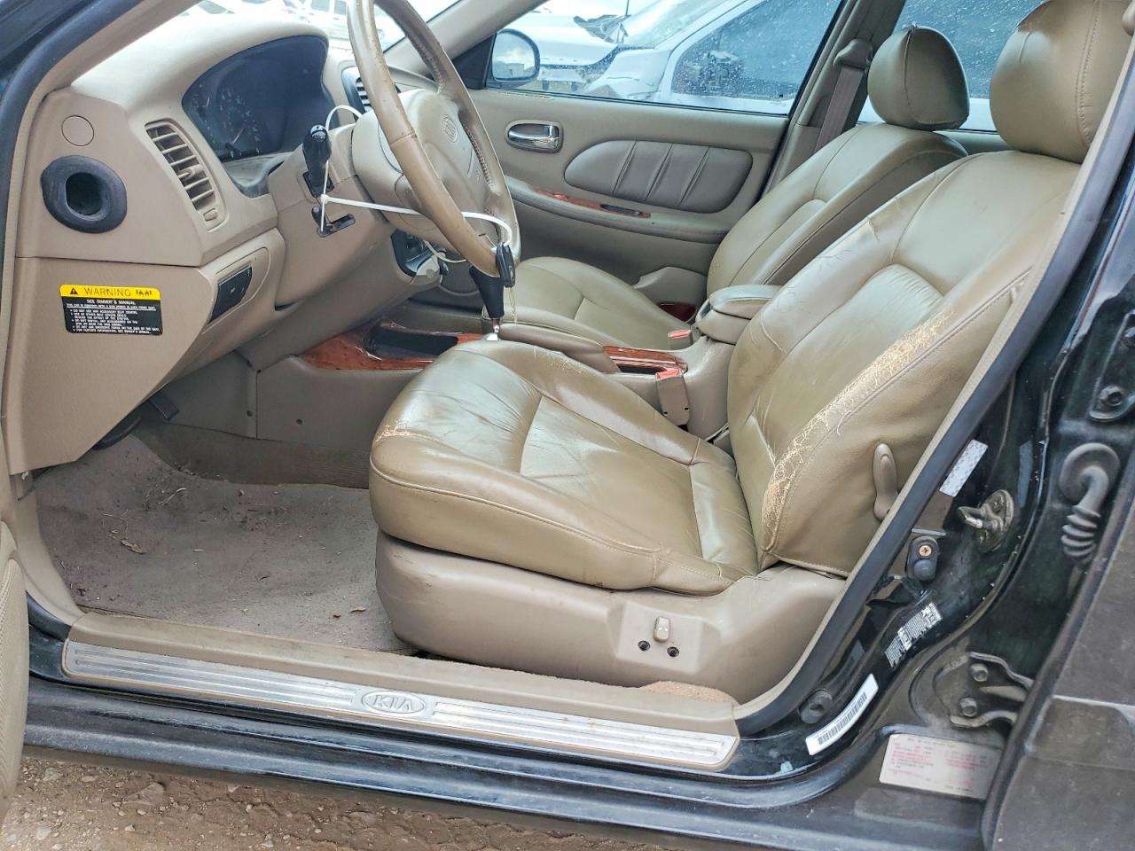 2002 Kia Optima Magentis Black vin: KNAGD128625123090