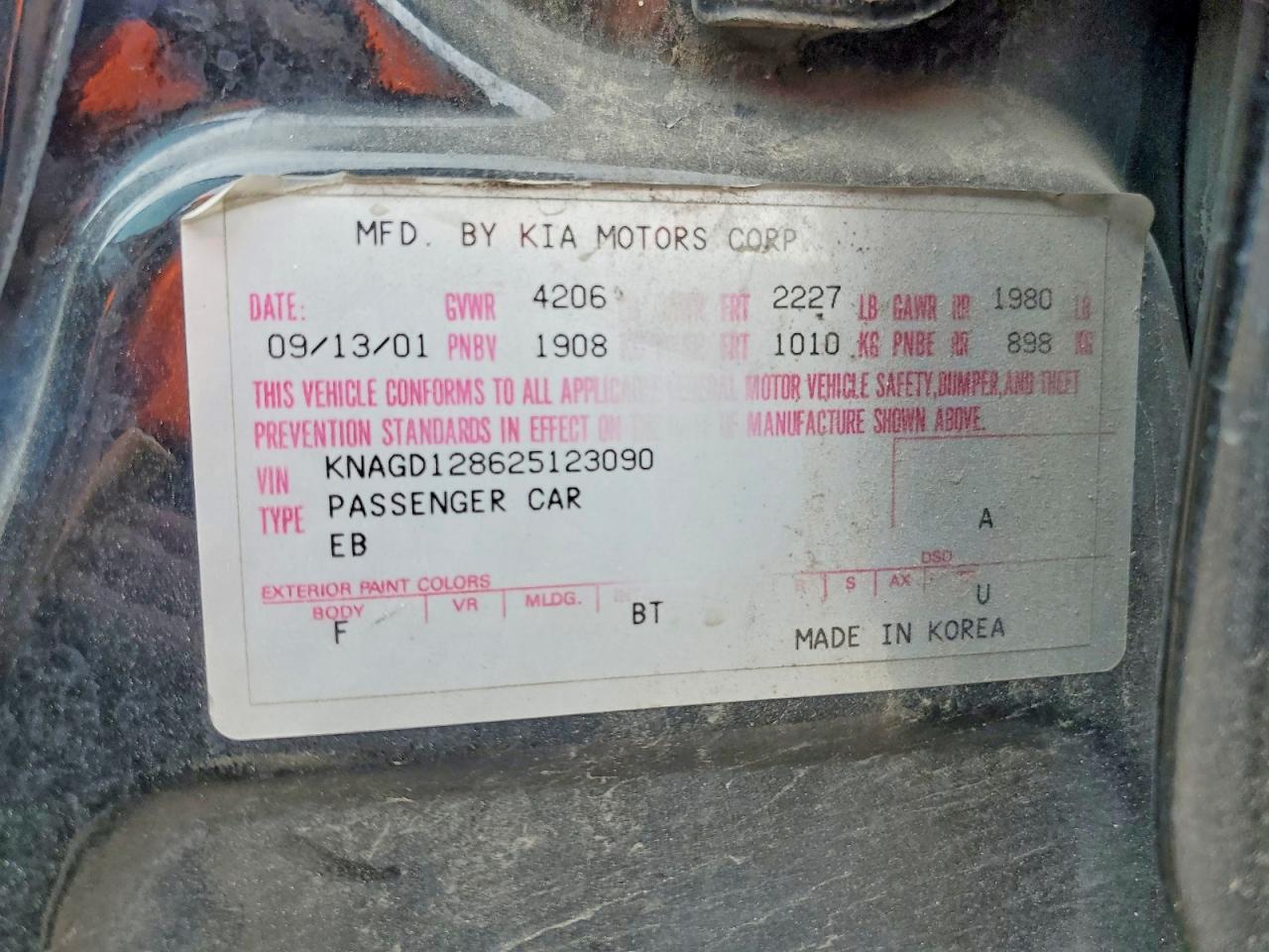 2002 Kia Optima Magentis Black vin: KNAGD128625123090