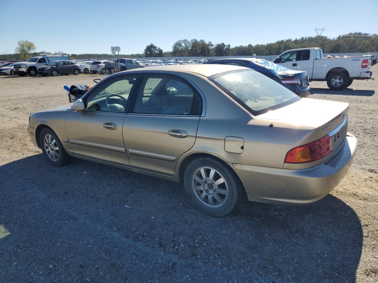 2002 Kia Optima Magentis Желто-коричневый vin: KNAGD128825158648