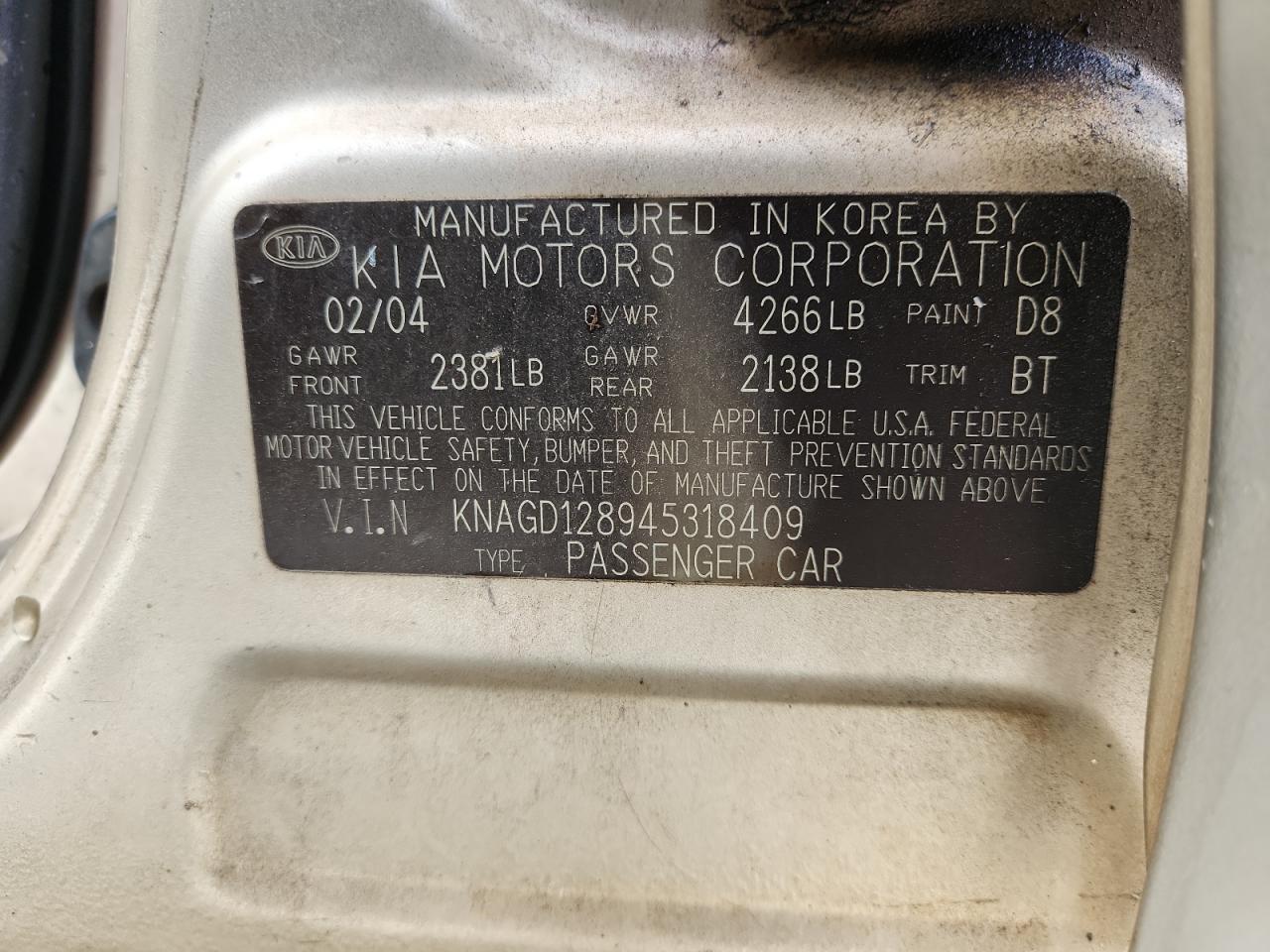 2004 Kia Optima Lx Beige vin: KNAGD128945318409