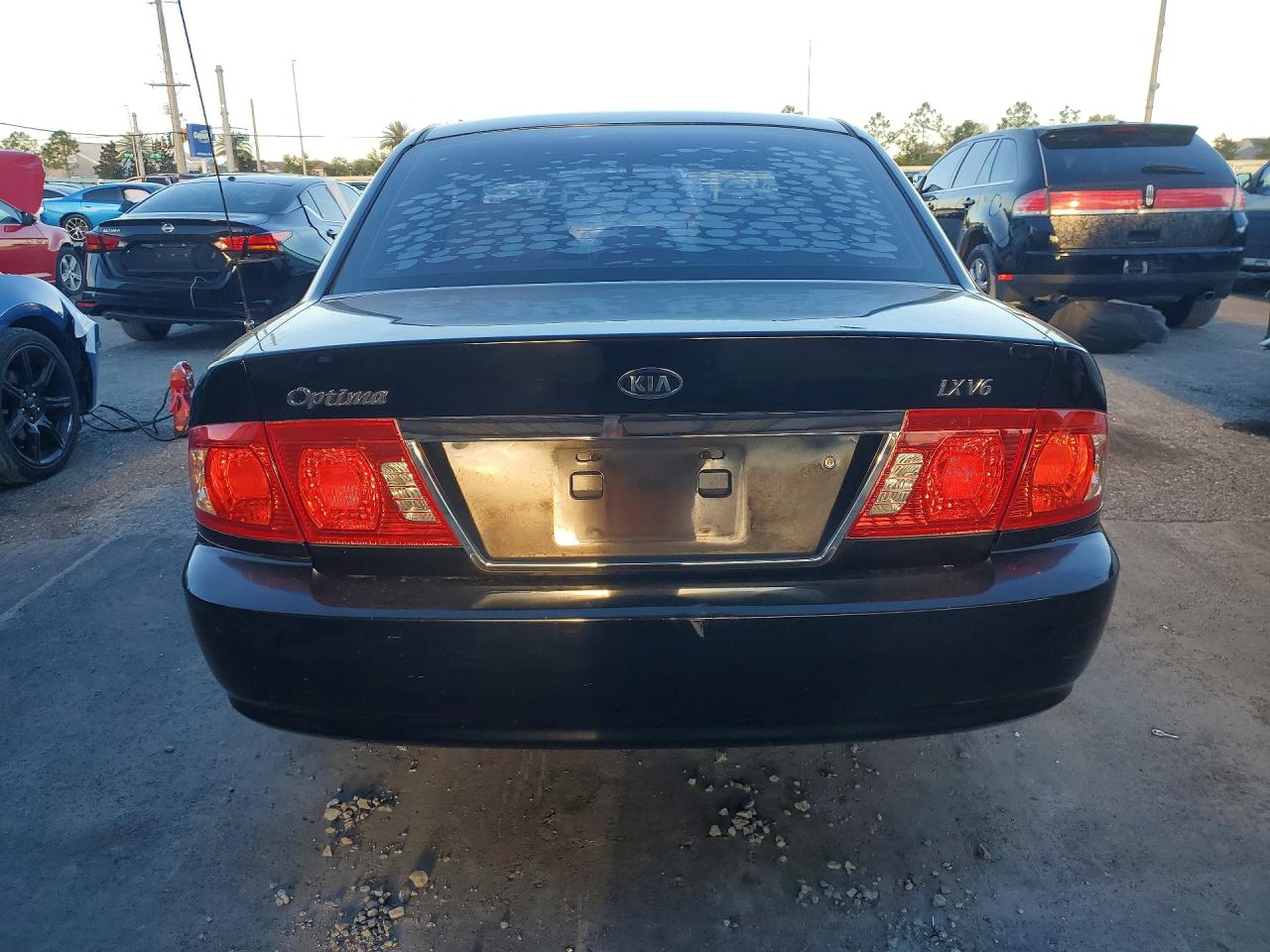 2005 Kia Optima Lx V6 Черный vin: KNAGD128955393130