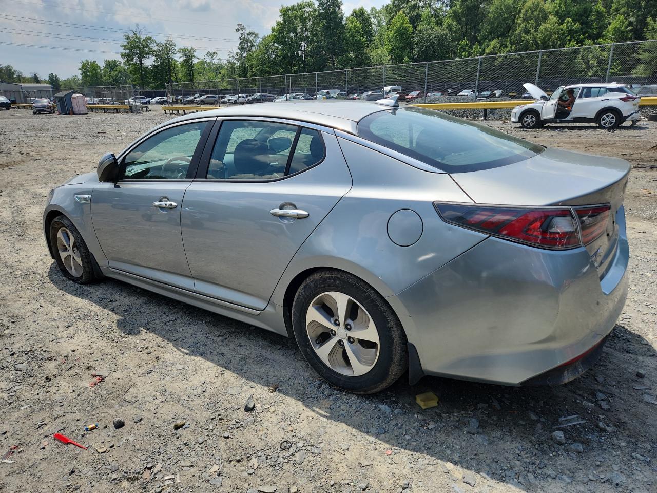 2015 Kia Optima Hybrid Silver vin: KNAGM4AD3F5086232 Damage: Left Qtr Panel, Dent(S) W/ Paint Dmg, 1/8 To 1/2 Inch